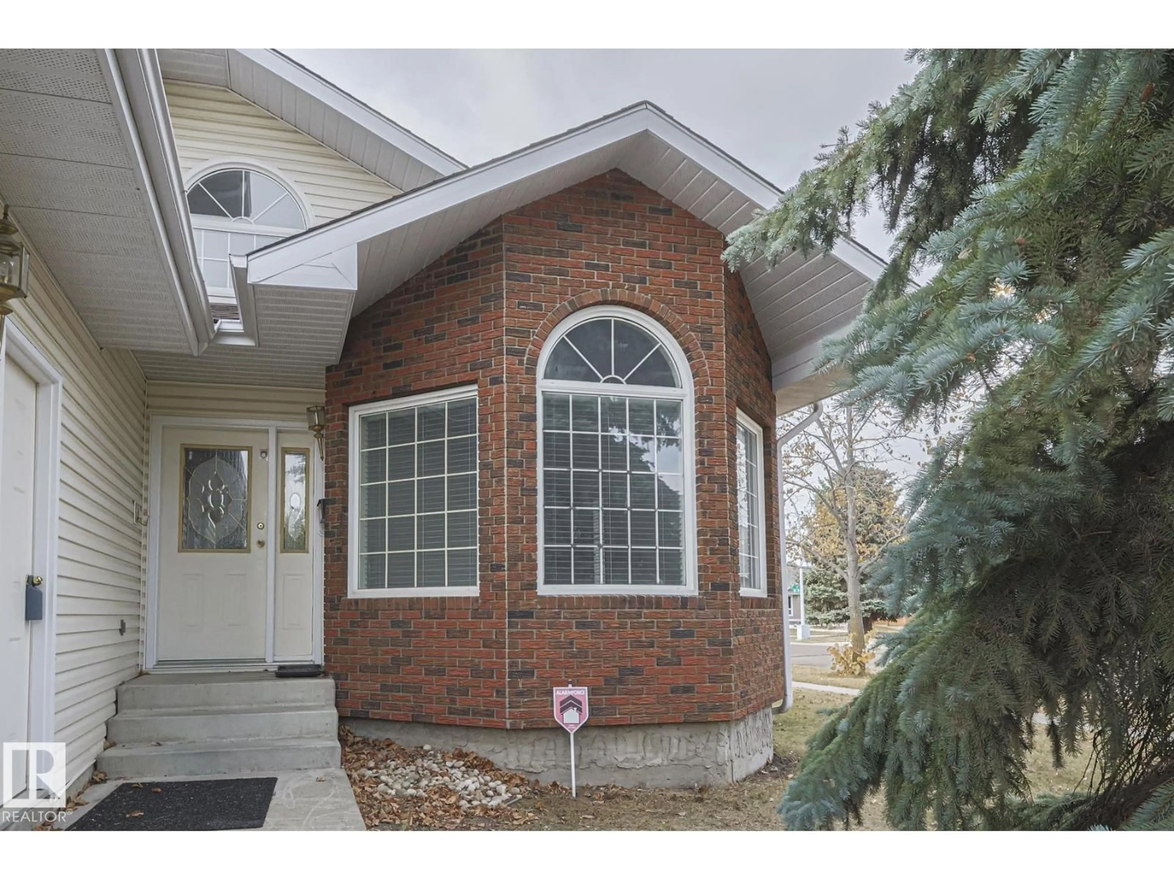 Home with brick exterior material, street for 4631 43 AV, Edmonton Alberta T6L6L9