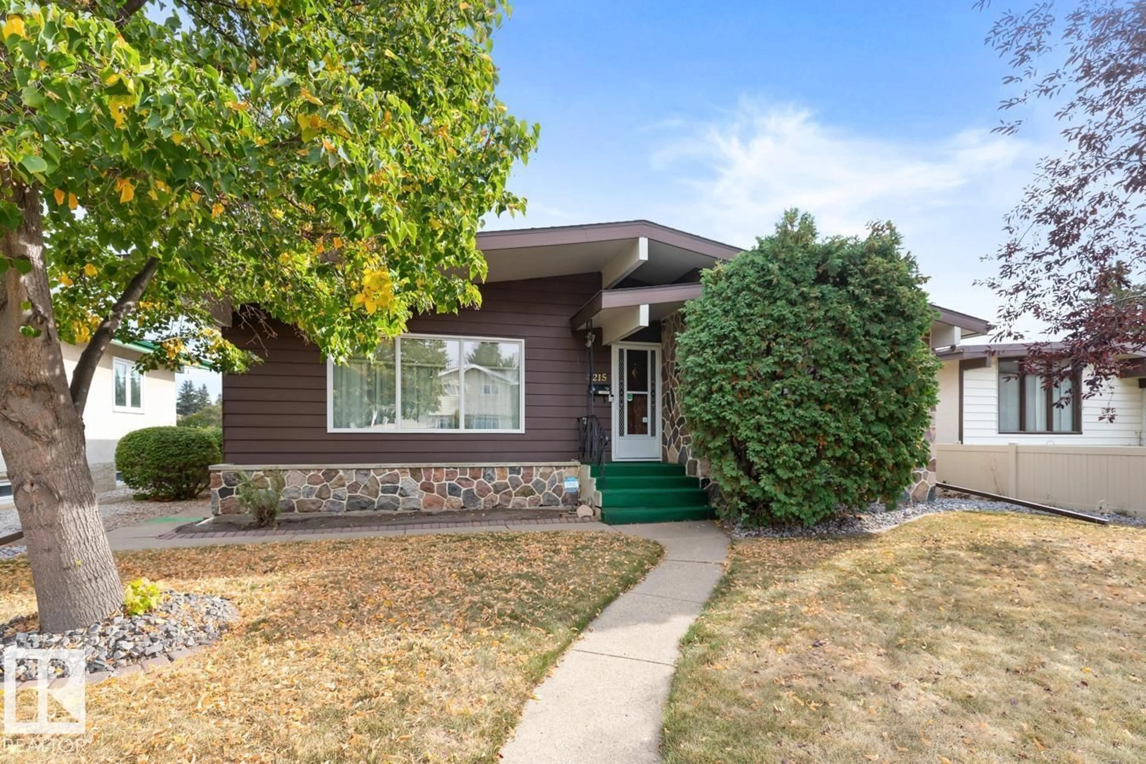 Home with vinyl exterior material, street for 4215 117 ST, Edmonton Alberta T6J1T5