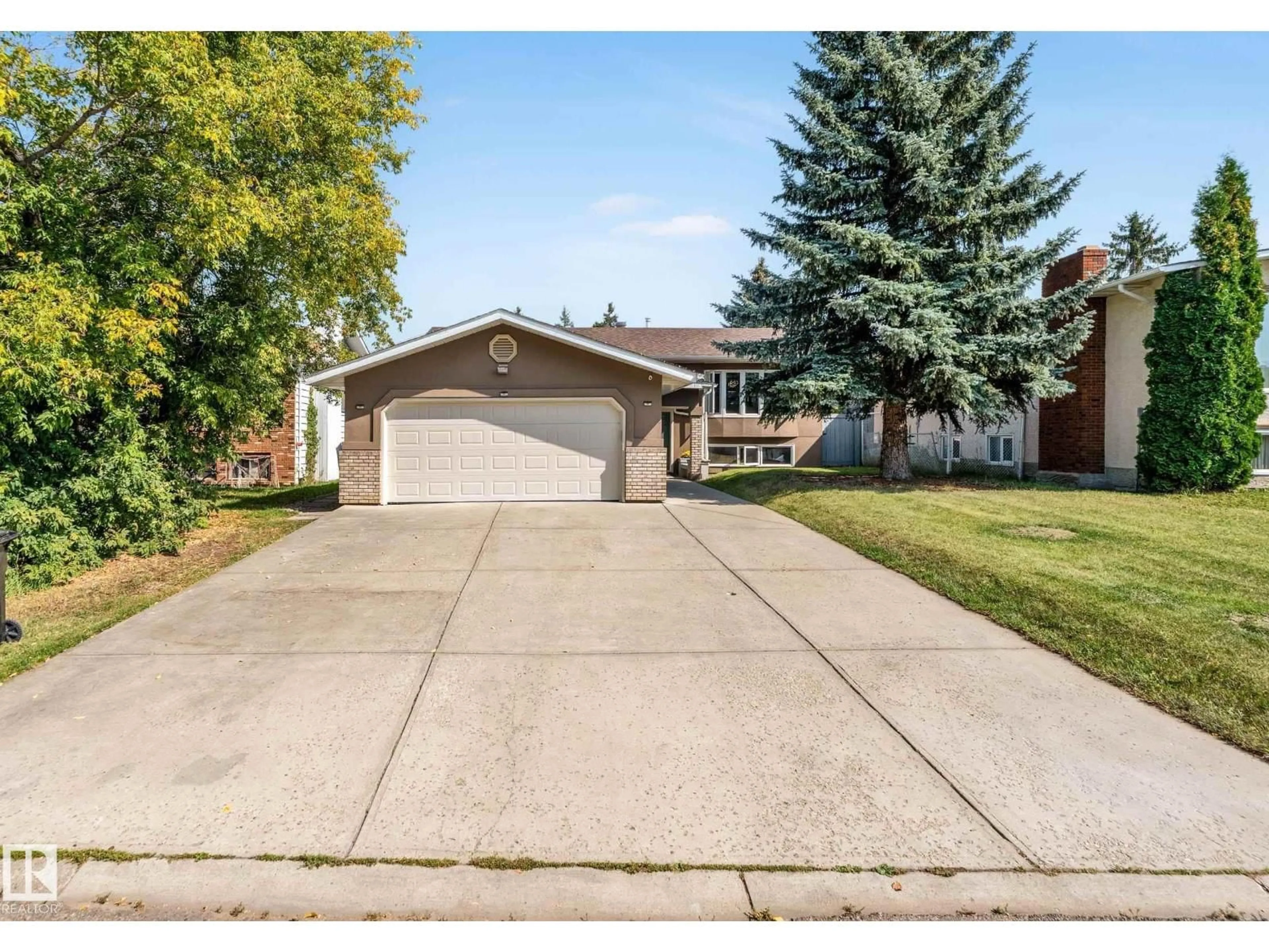 Home with vinyl exterior material, street for 3923 67 ST, Edmonton Alberta T6K2N7