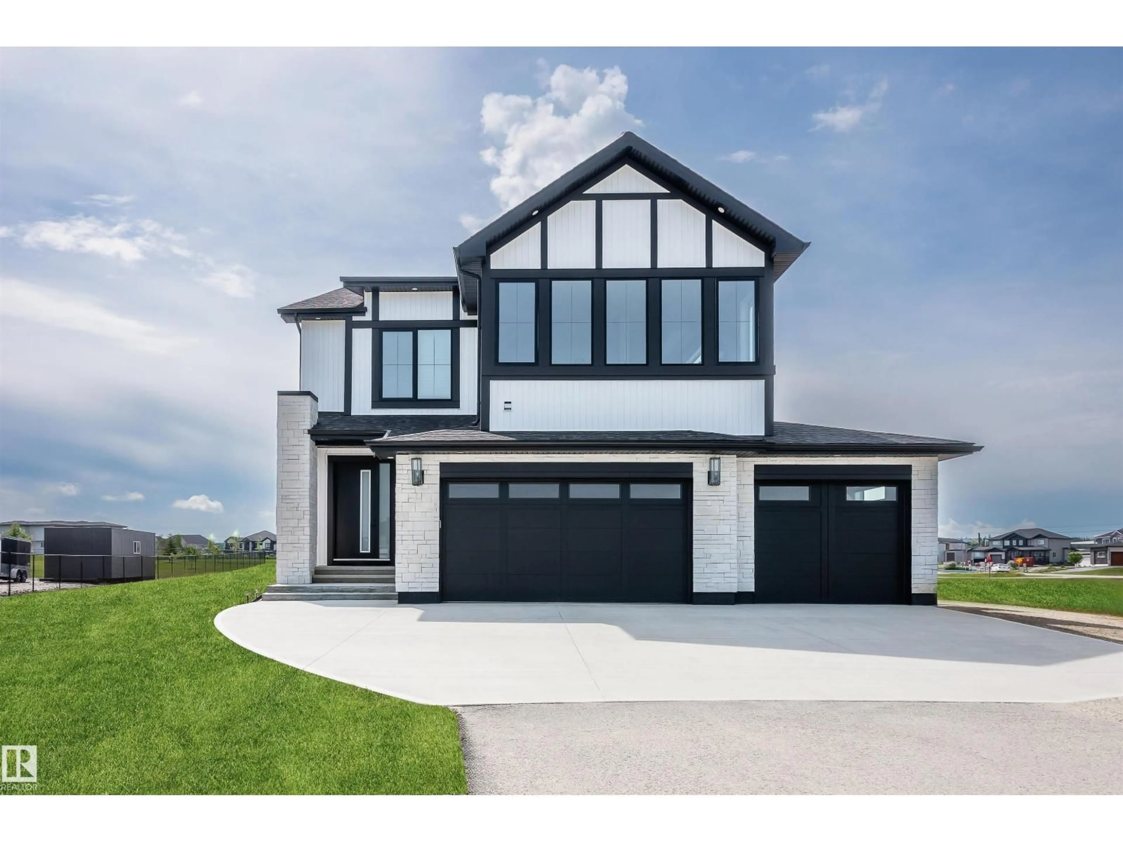 Home with vinyl exterior material, street for 43 - 26409 TWP RD 532 A, Rural Parkland County Alberta T7X0W7