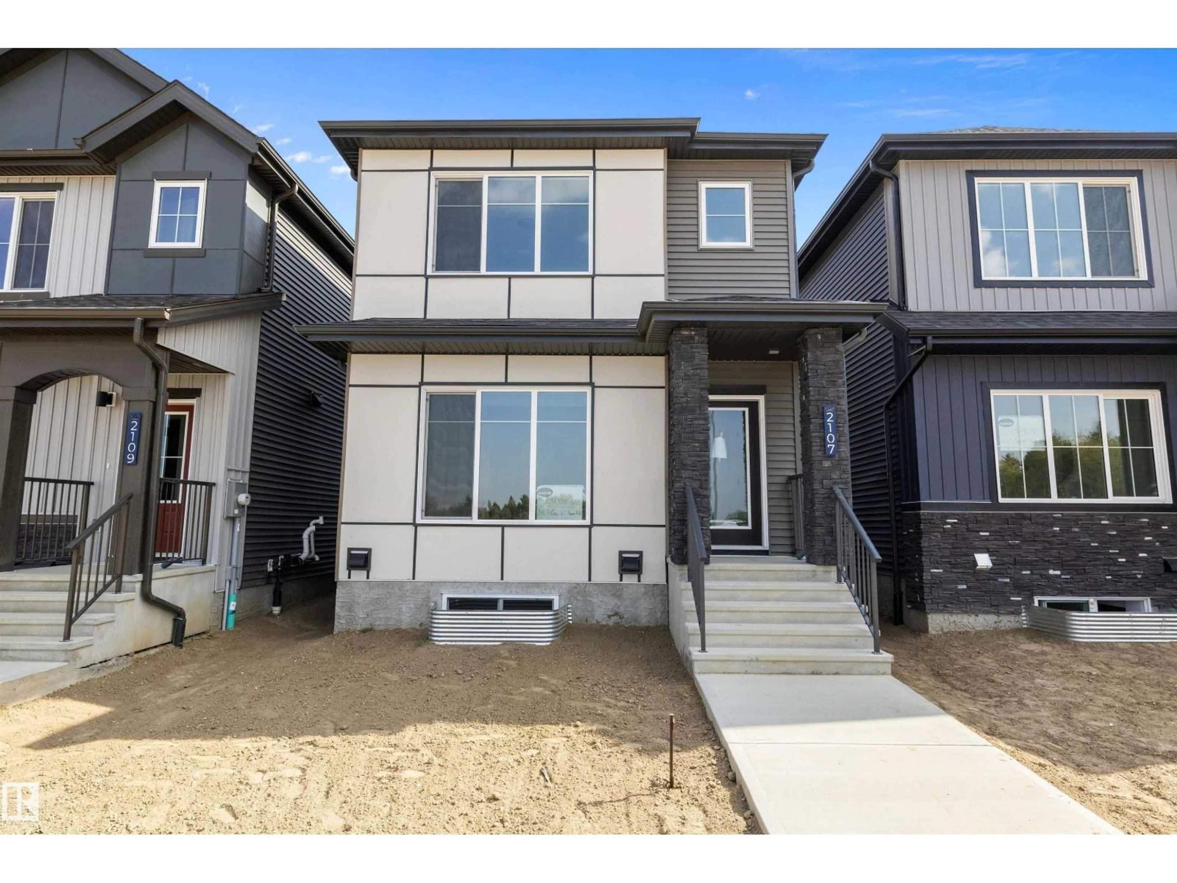 Home with vinyl exterior material, street for 2107 CROSSBILL LN, Edmonton Alberta T5S0T9