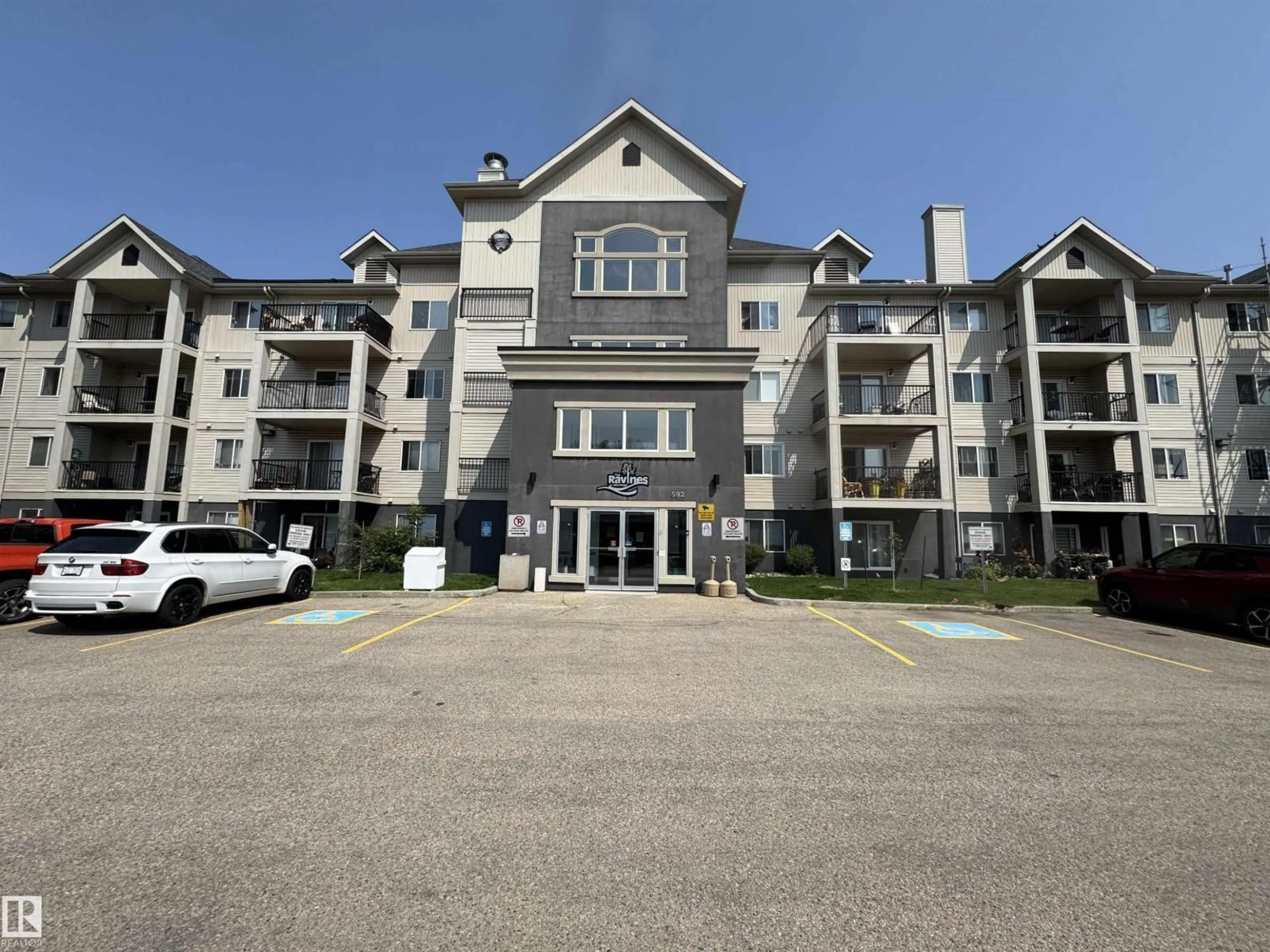 A pic from outside/outdoor area/front of a property/back of a property/a pic from drone, unknown for 592 - 131 HOOKE RD, Edmonton Alberta T5A5H2