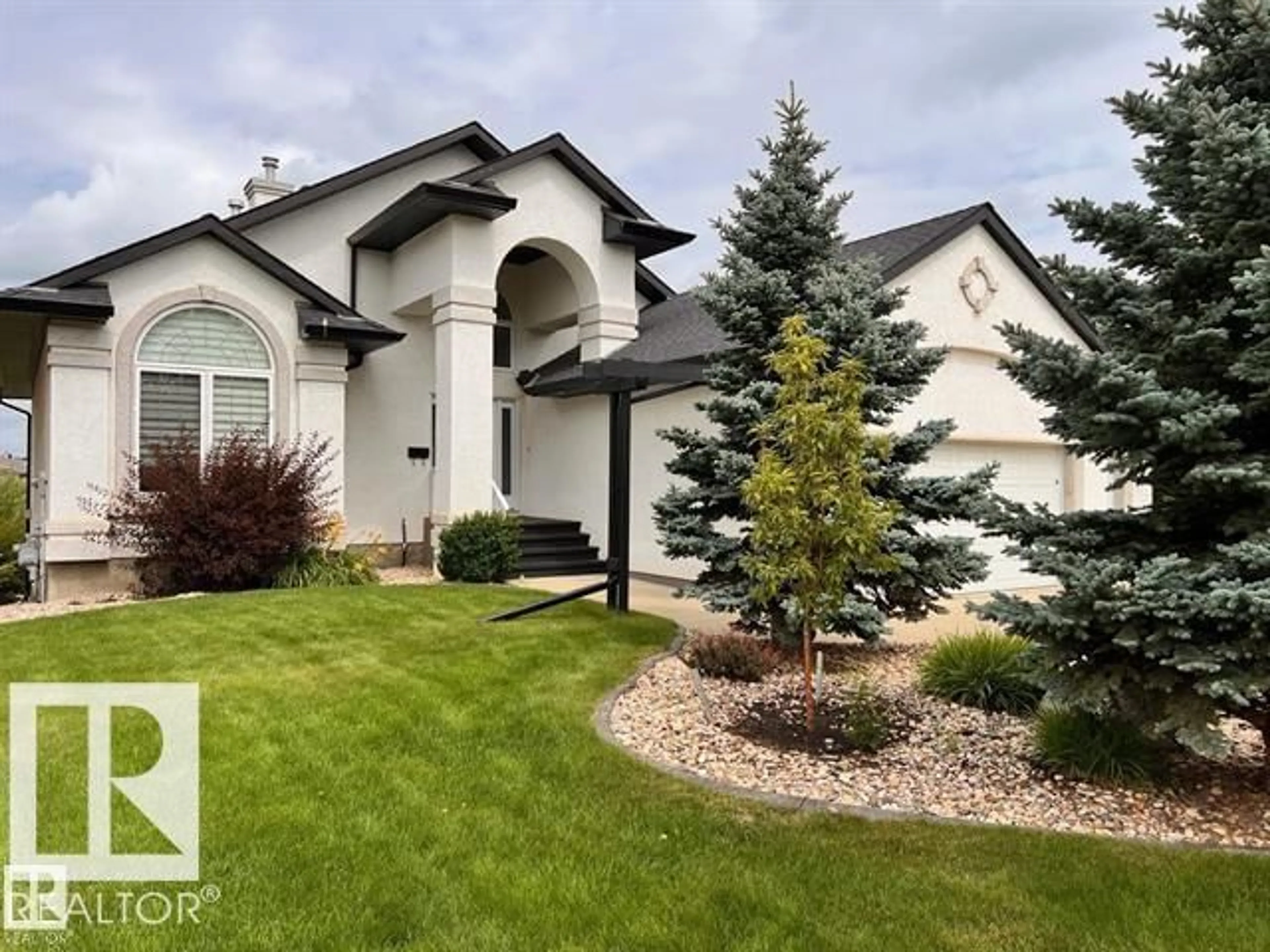 Home with vinyl exterior material, street for 46 SHORES DR, Leduc Alberta T9E8N7