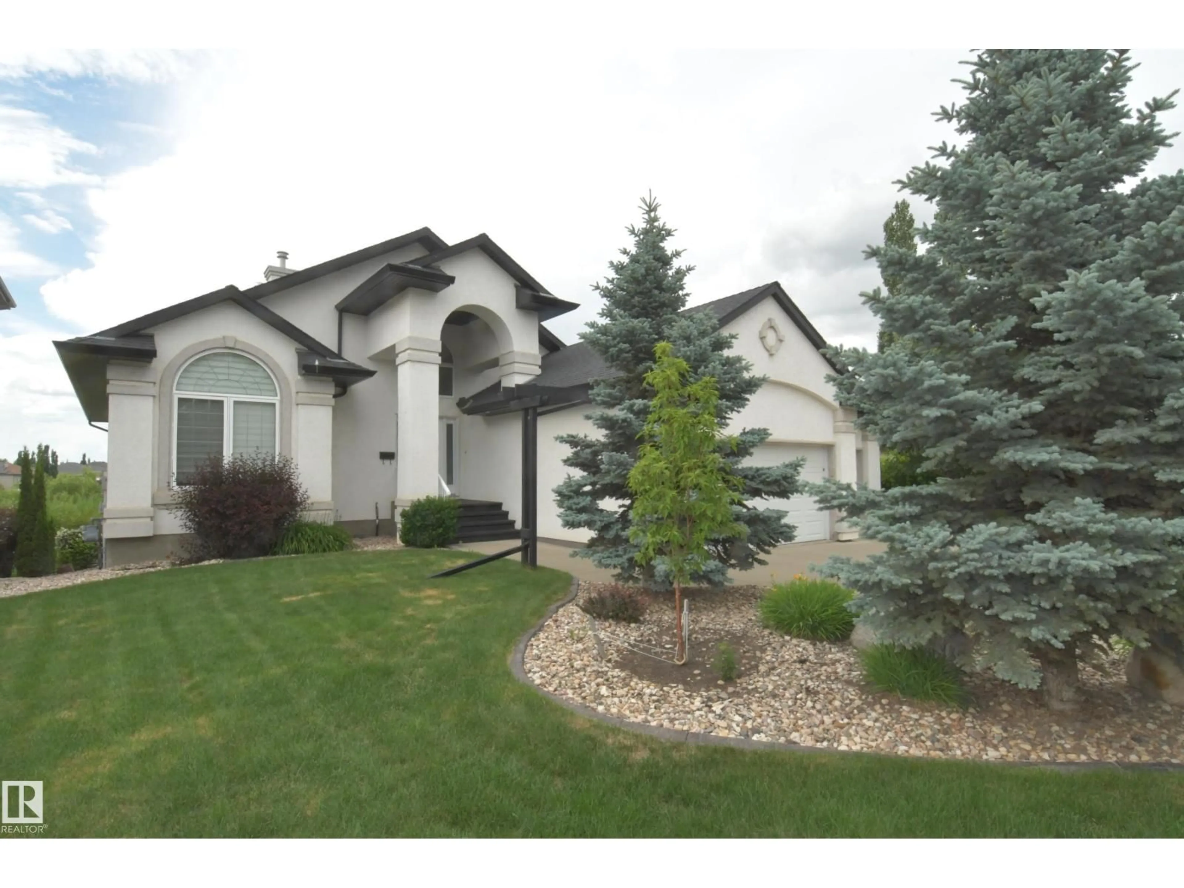 Home with vinyl exterior material, street for 46 SHORES DR, Leduc Alberta T9E8N7