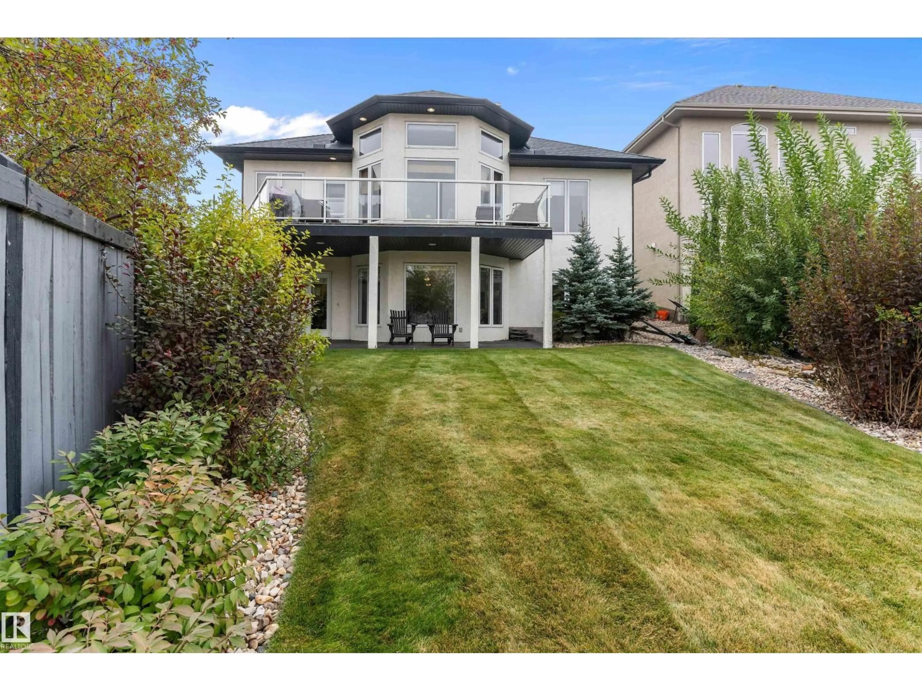 Home with vinyl exterior material, street for 46 SHORES DR, Leduc Alberta T9E8N7