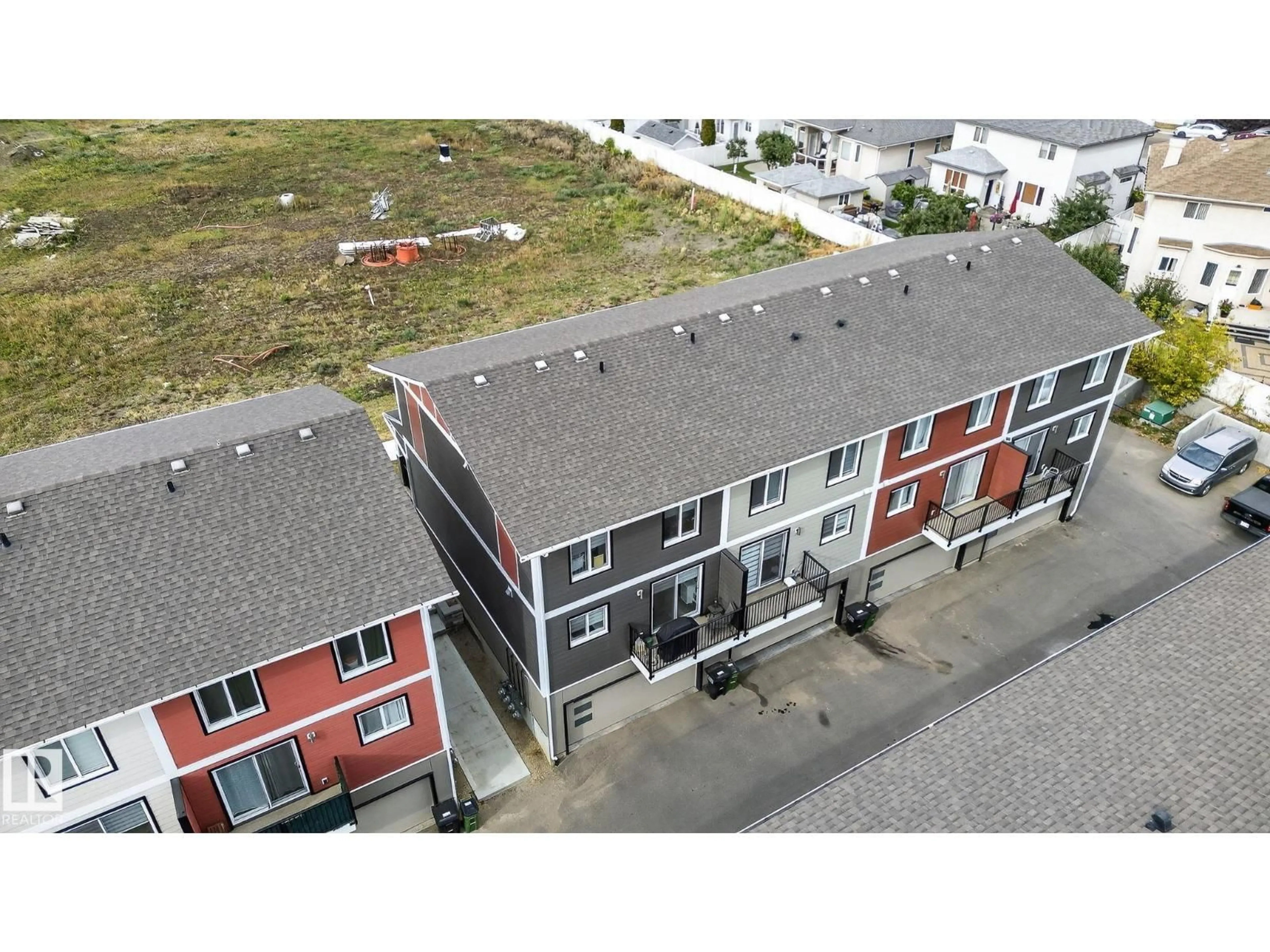 A pic from outside/outdoor area/front of a property/back of a property/a pic from drone, building for #16 - 9250 156 AV NW, Edmonton Alberta T5Z3N7