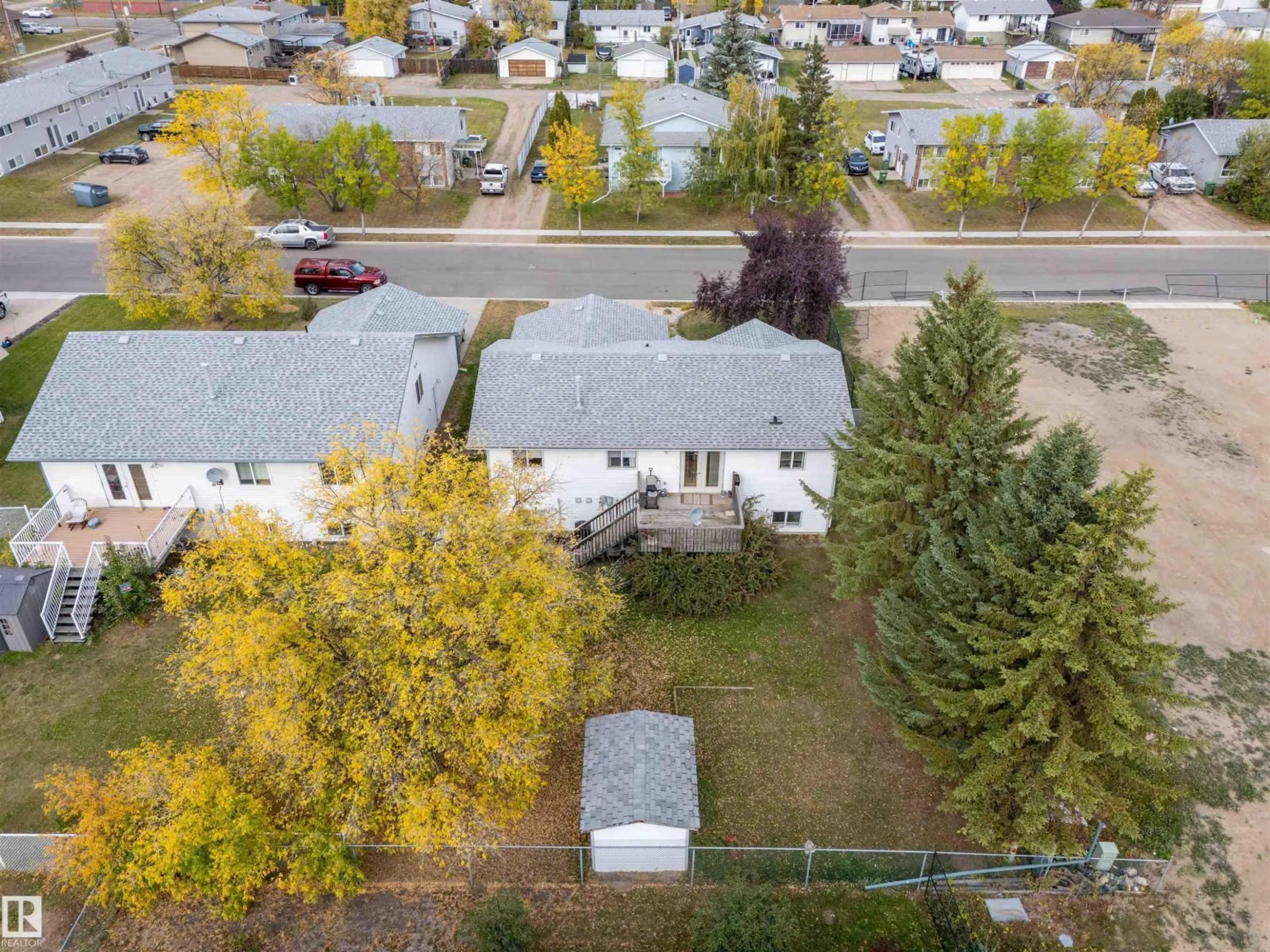 A pic from outside/outdoor area/front of a property/back of a property/a pic from drone, street for 4504 46 AV, Bonnyville Town Alberta T9N1M1