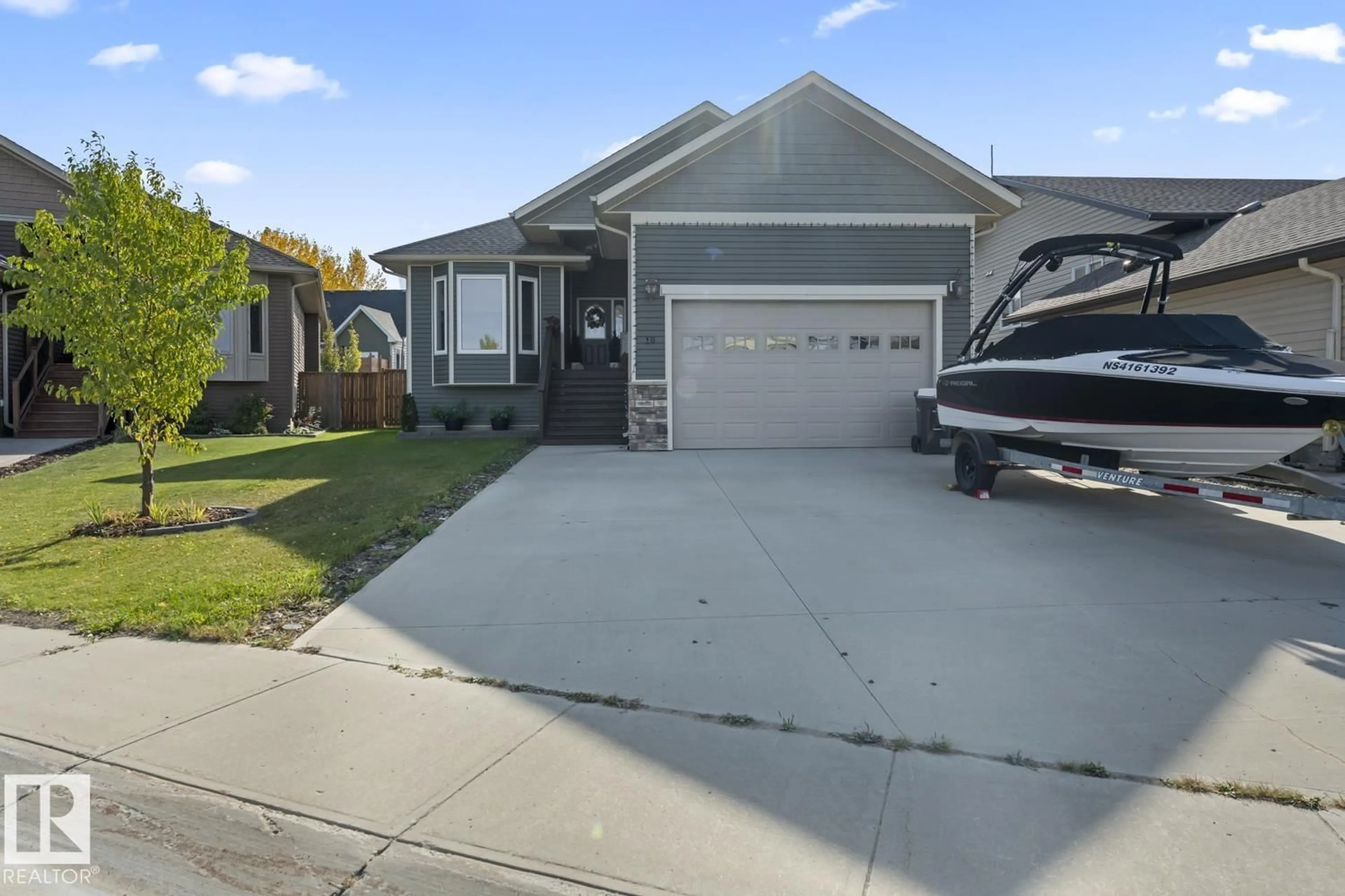 Home with vinyl exterior material, street for 10 ASPEN, Cold Lake Alberta T9M0G2