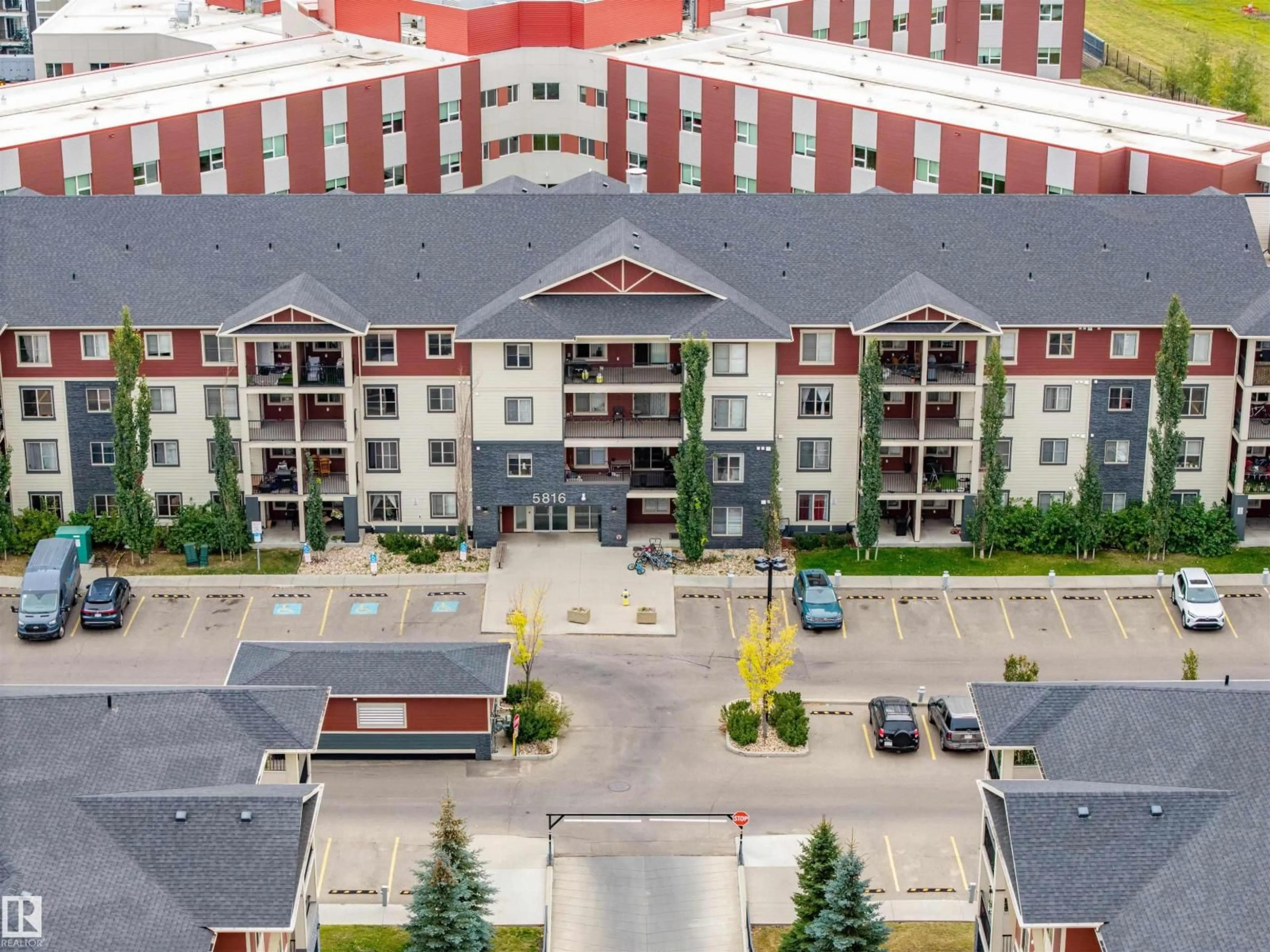 A pic from outside/outdoor area/front of a property/back of a property/a pic from drone, city buildings view from balcony for 202 - 5816 MULLEN PL, Edmonton Alberta T6R0W3