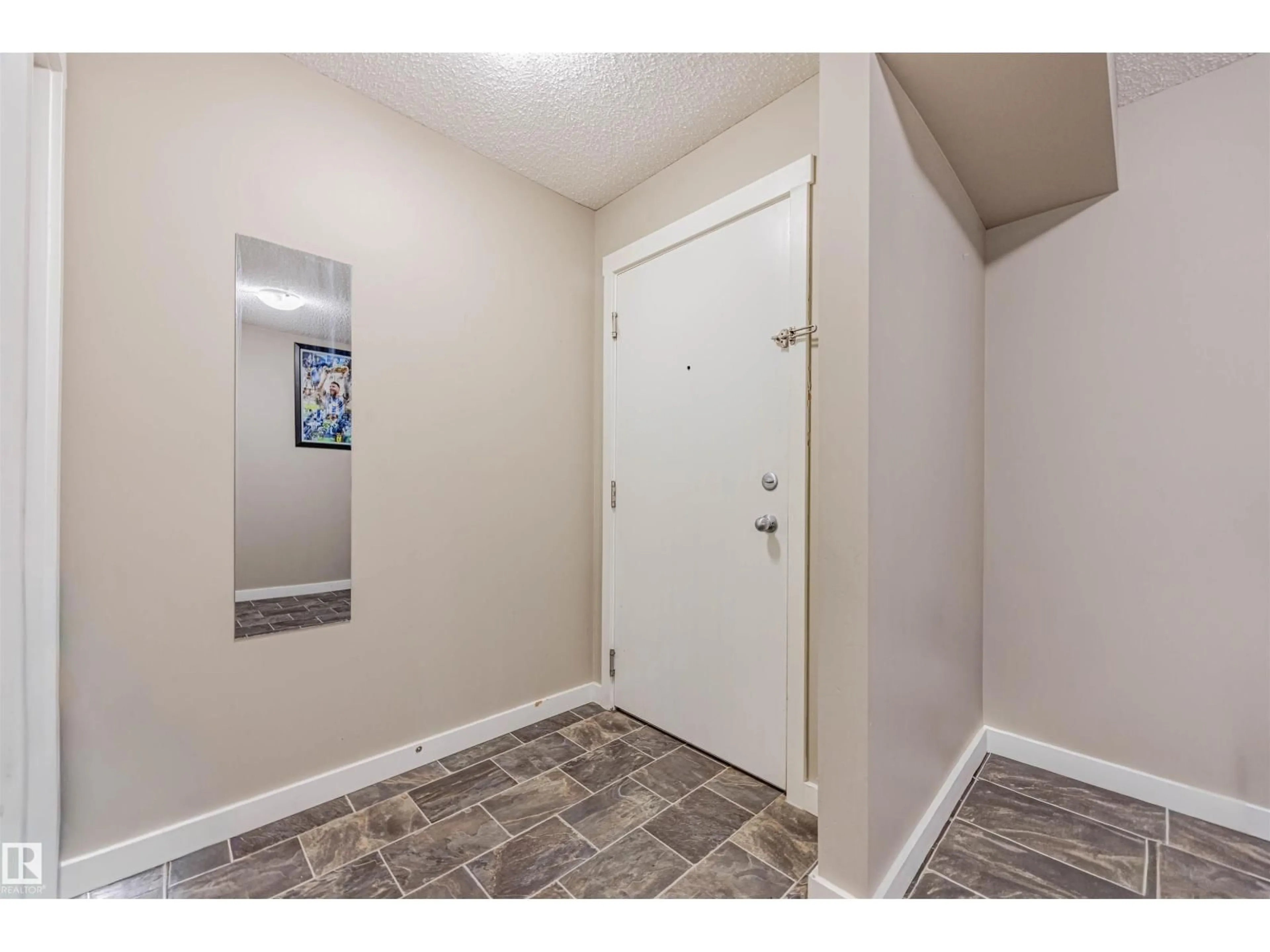 Indoor entryway for 202 - 5816 MULLEN PL, Edmonton Alberta T6R0W3