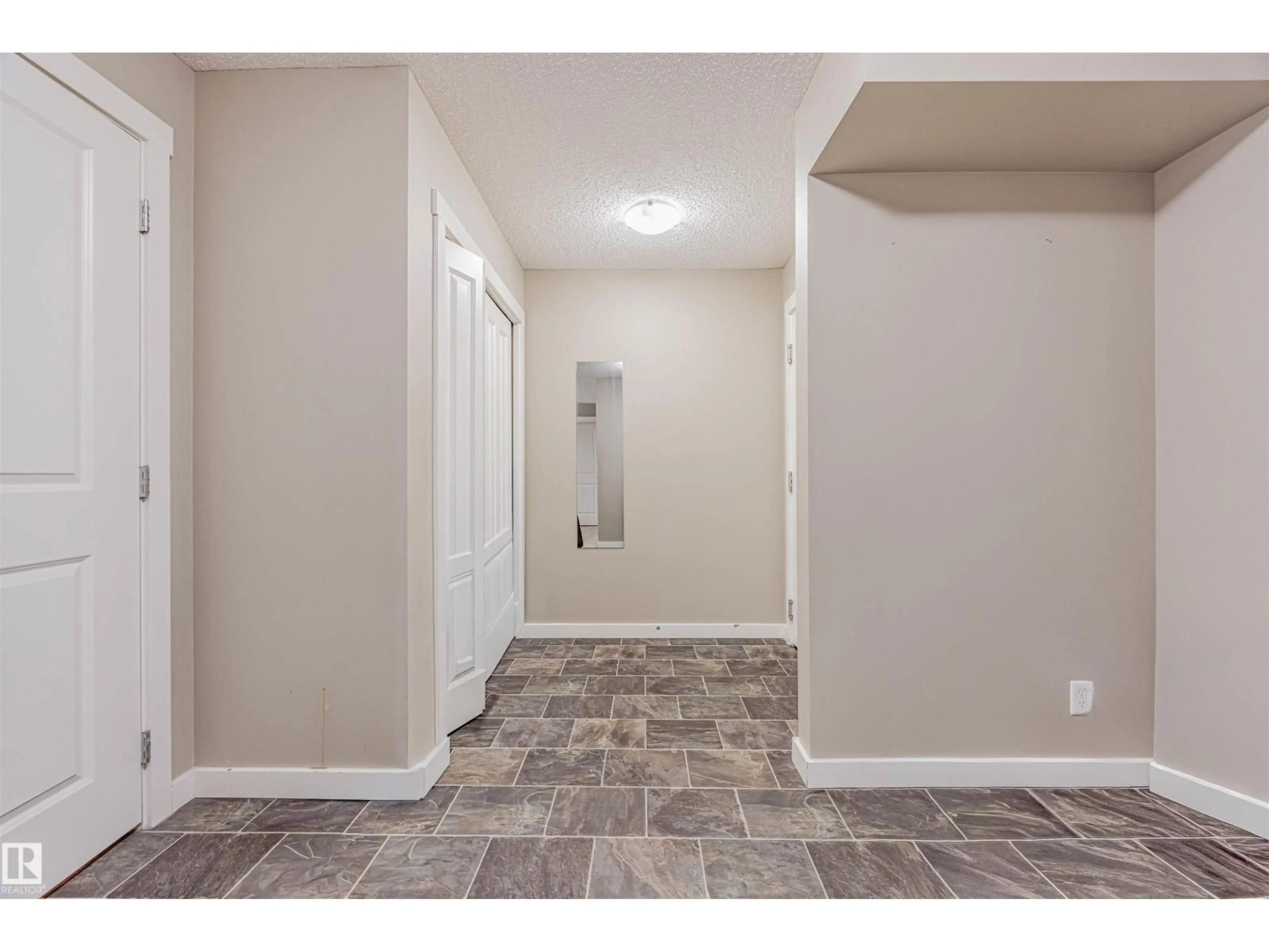 Indoor entryway for 202 - 5816 MULLEN PL, Edmonton Alberta T6R0W3