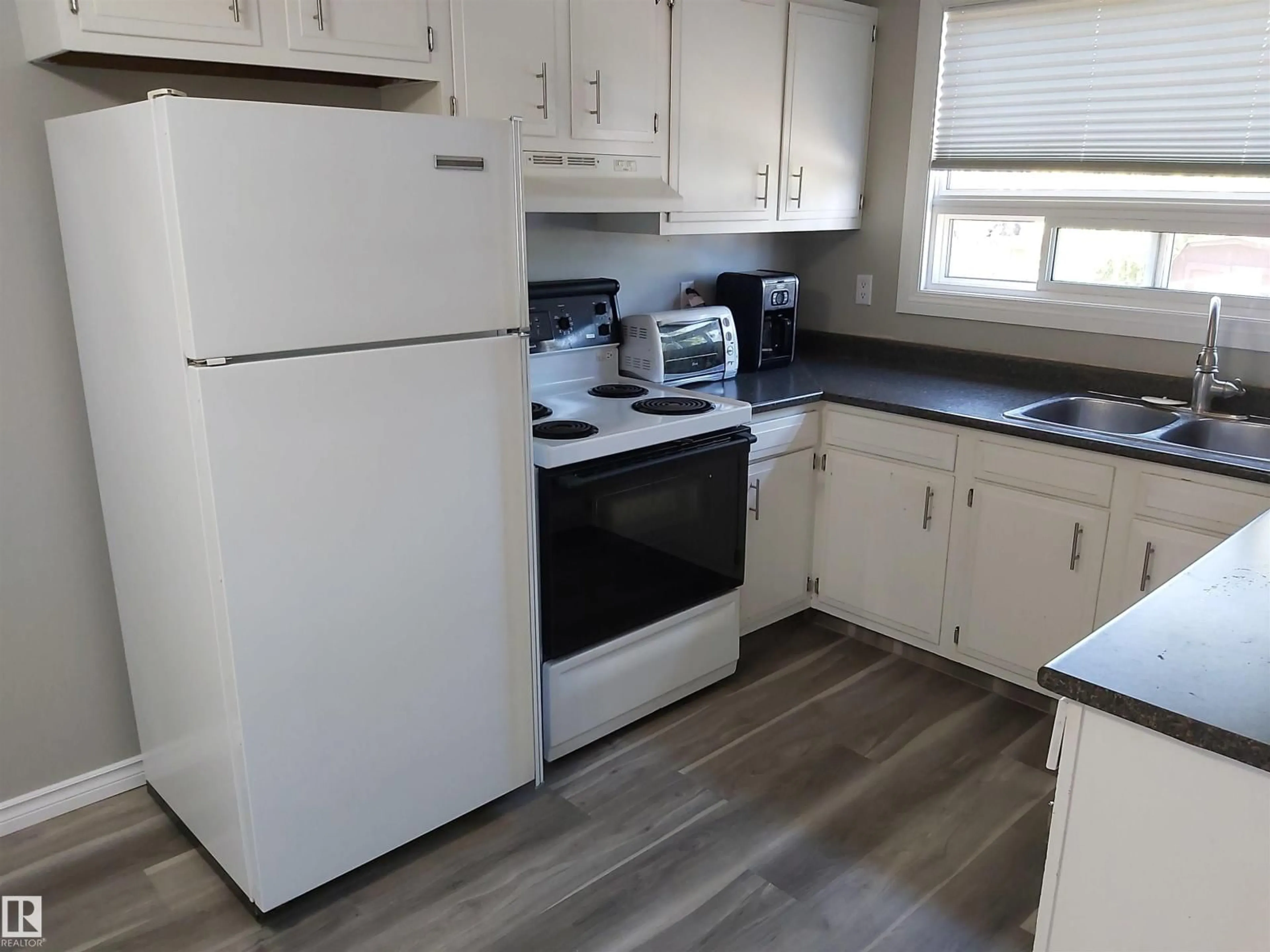 Standard kitchen, wood/laminate floor for 303 19 ST, Cold Lake Alberta T9M1B7