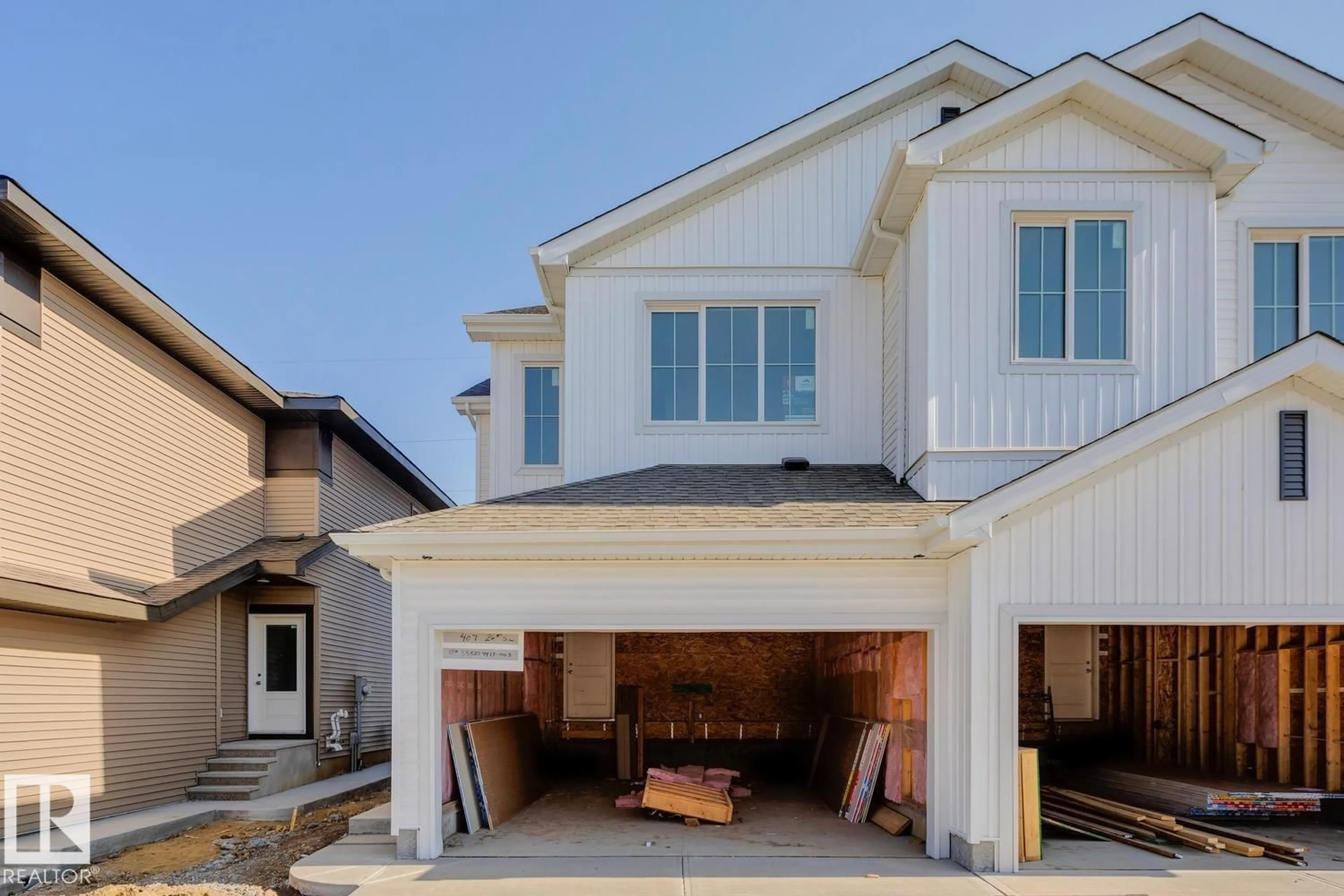 Home with vinyl exterior material, street for 407 26 ST, Edmonton Alberta T6X3E8