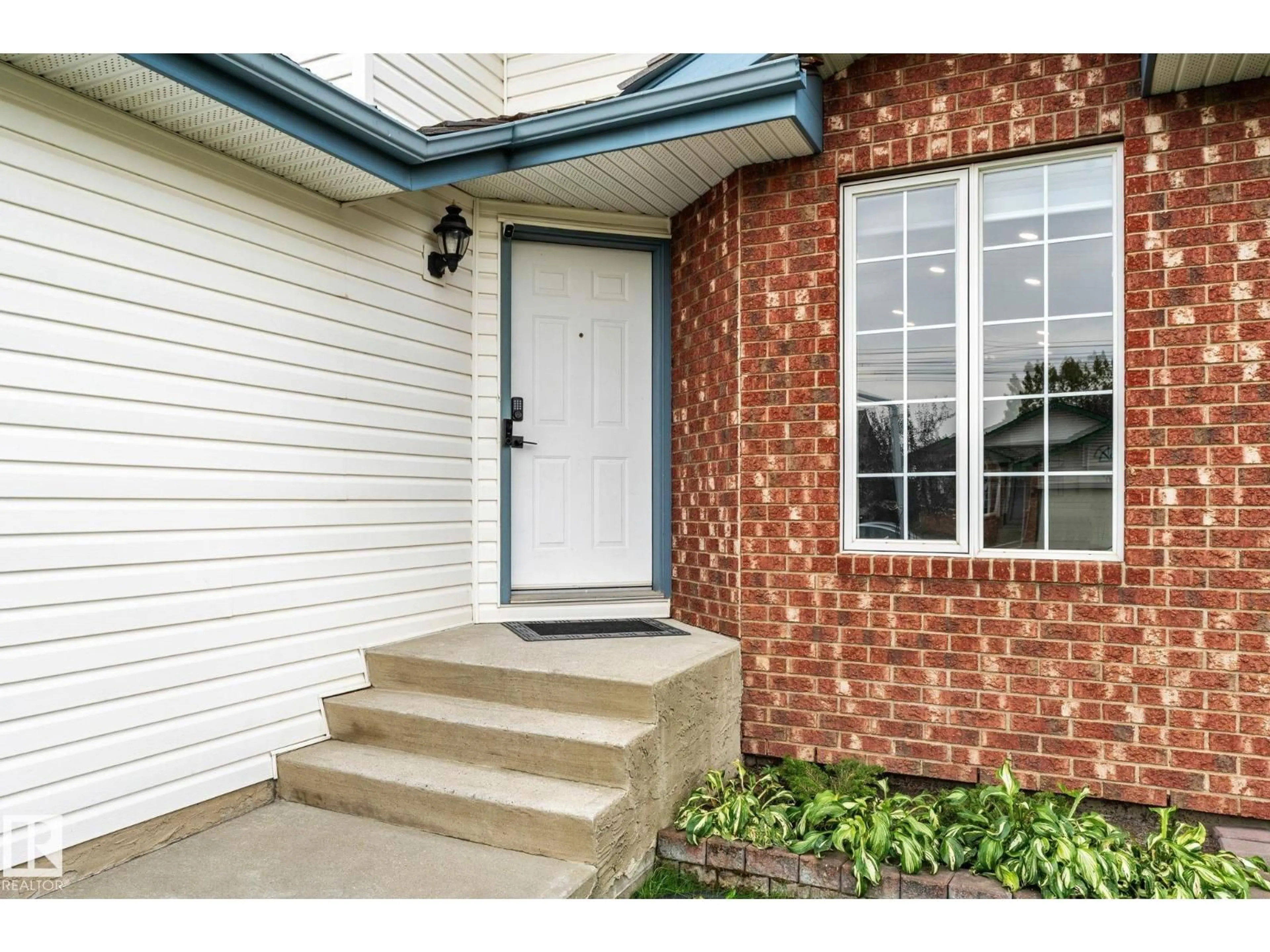 Home with brick exterior material, street for 362 BLACKBURN DR, Edmonton Alberta T6W1B8