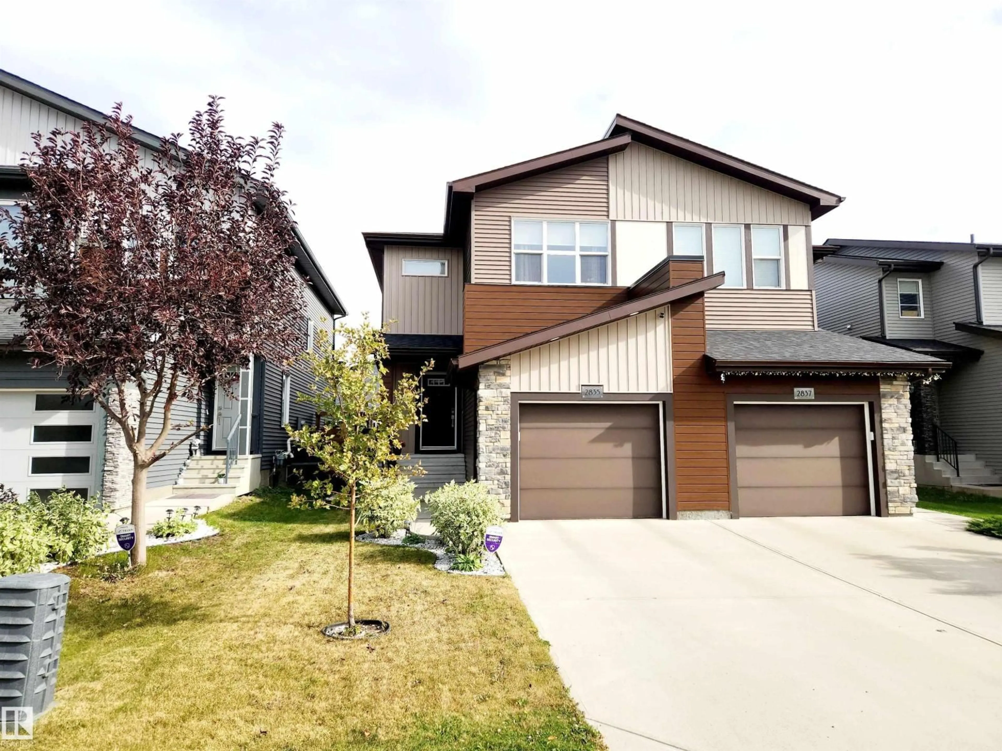 Home with vinyl exterior material, street for 2835 KOSHAL CR, Edmonton Alberta T6W3J7