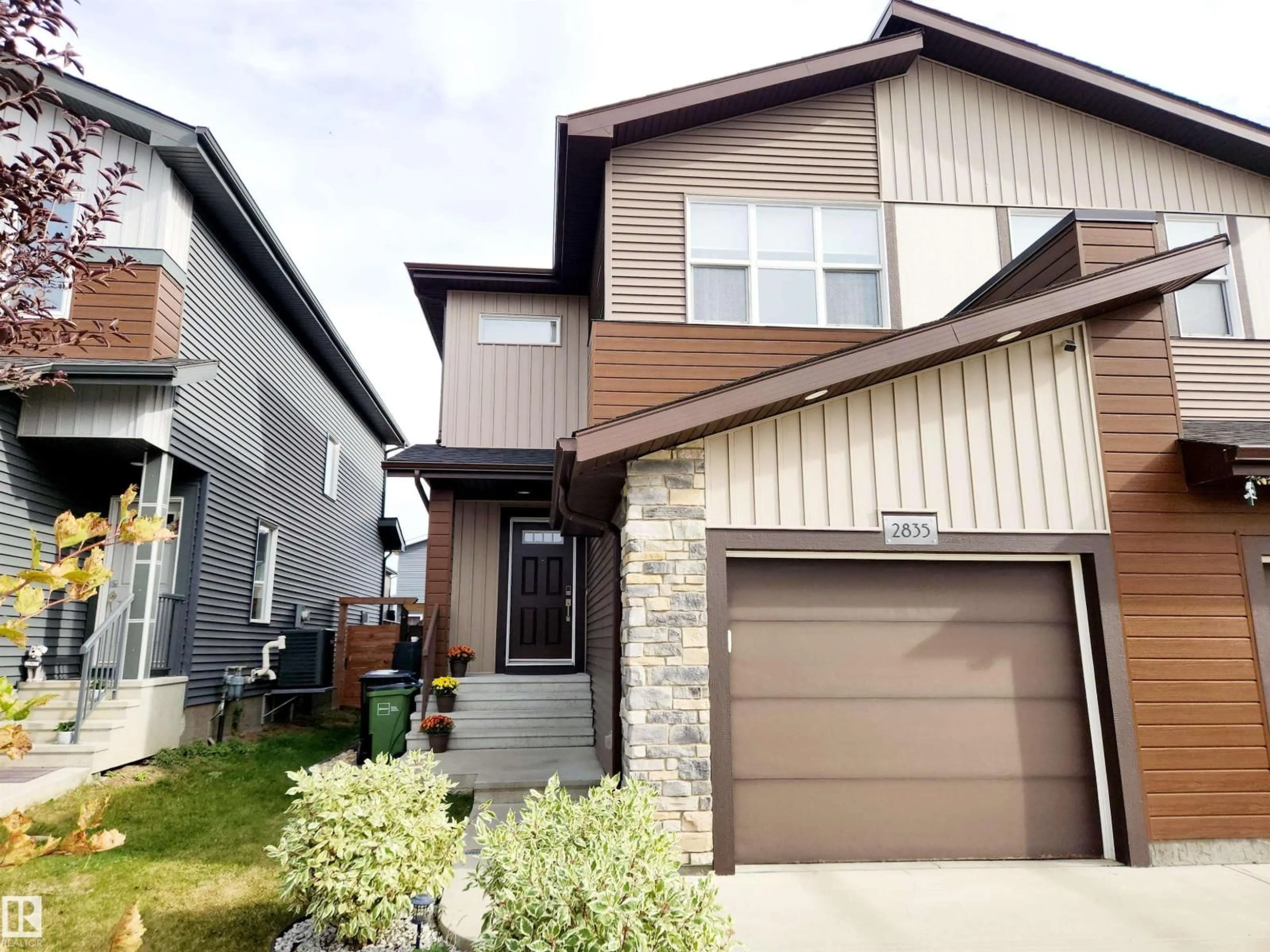 Home with vinyl exterior material, street for 2835 KOSHAL CR, Edmonton Alberta T6W3J7