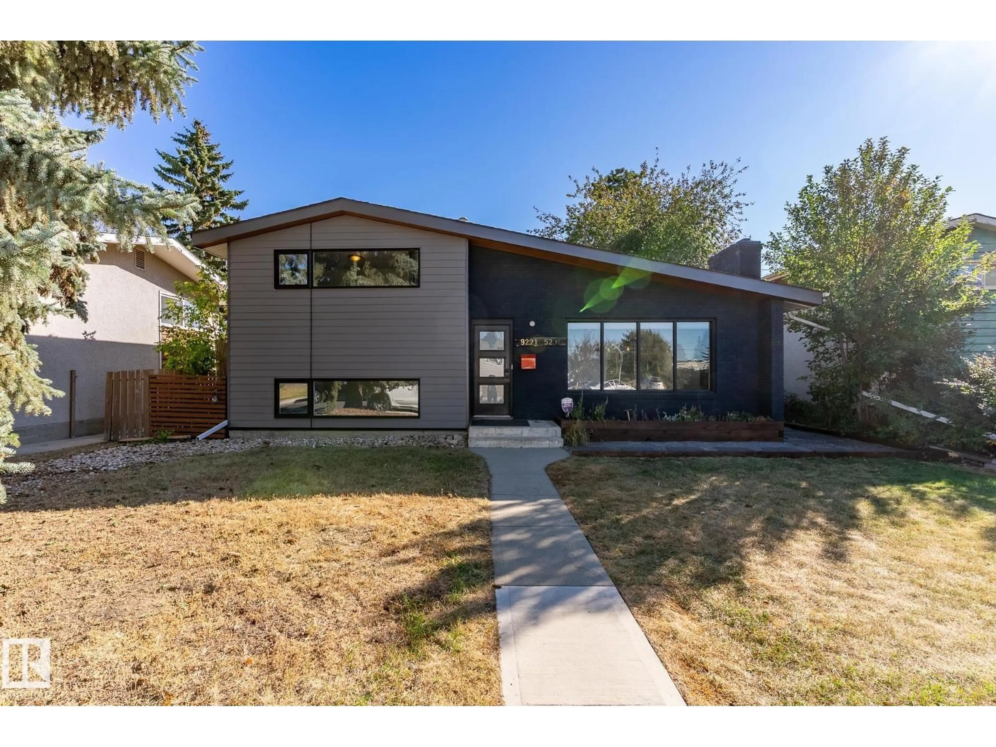 Home with brick exterior material, street for 9221 52 ST, Edmonton Alberta T6B1G3