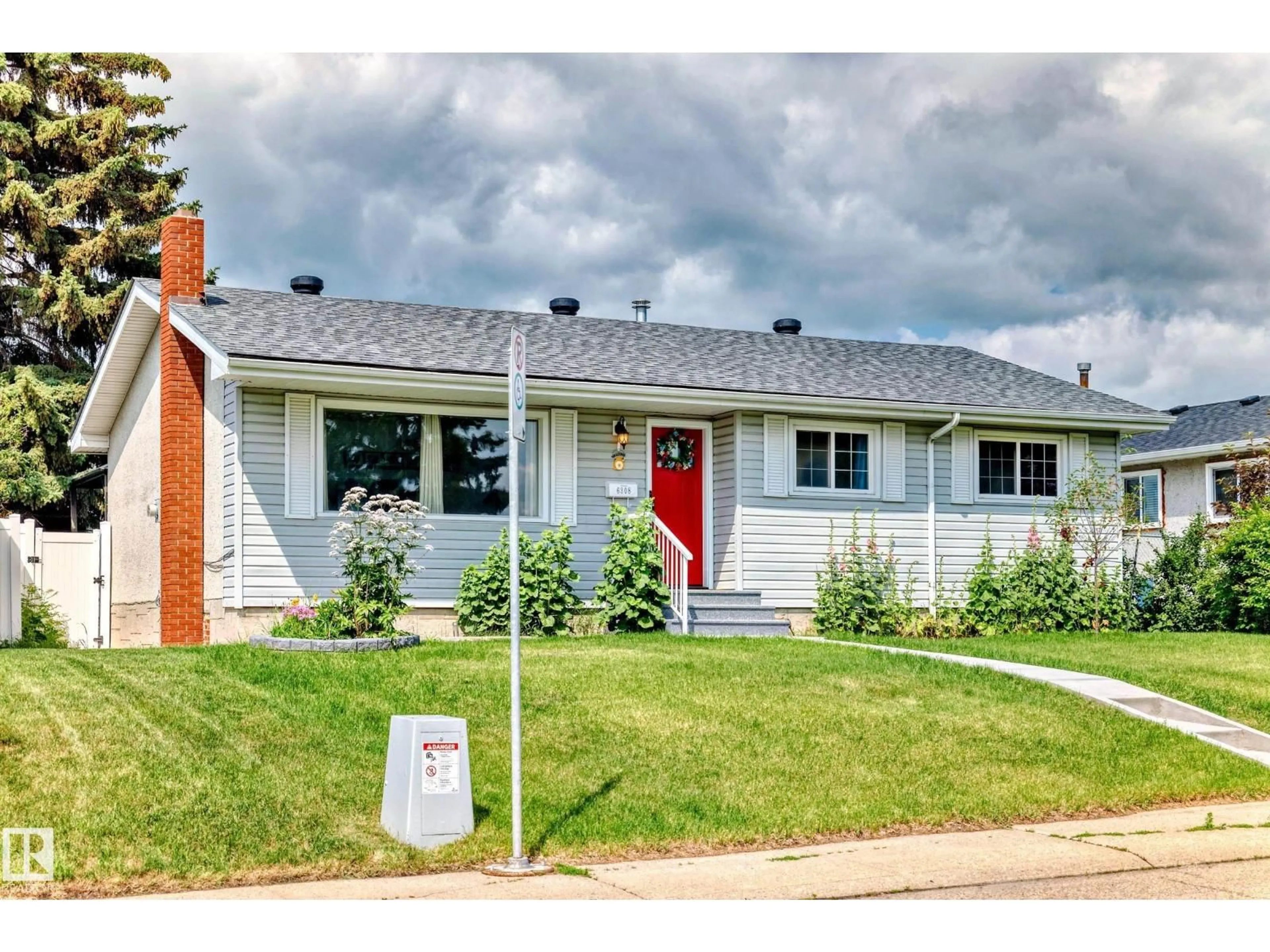 Home with vinyl exterior material, street for 6308 144A AV, Edmonton Alberta T5A1S4