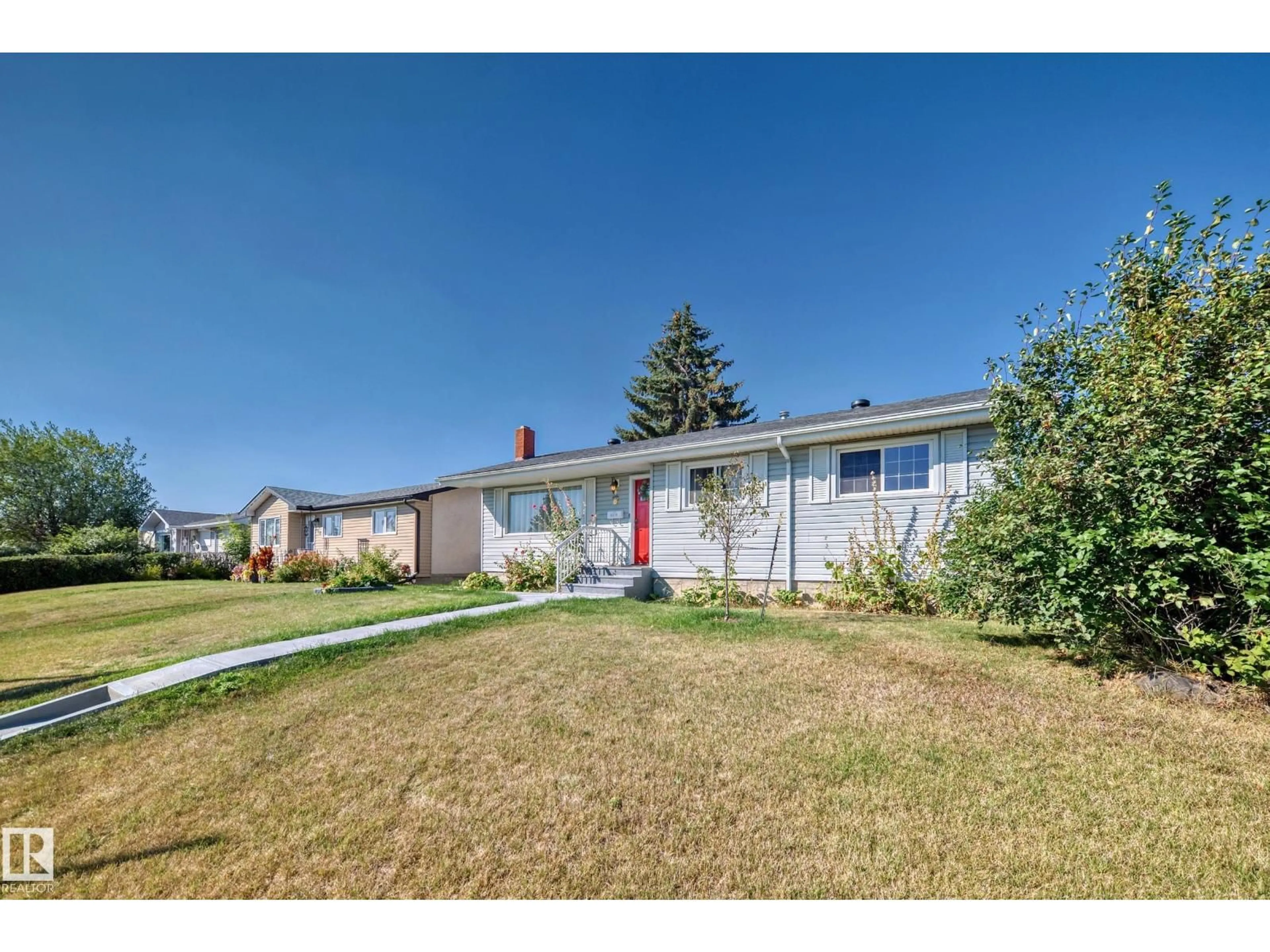 A pic from outside/outdoor area/front of a property/back of a property/a pic from drone, unknown for 6308 144A AV, Edmonton Alberta T5A1S4