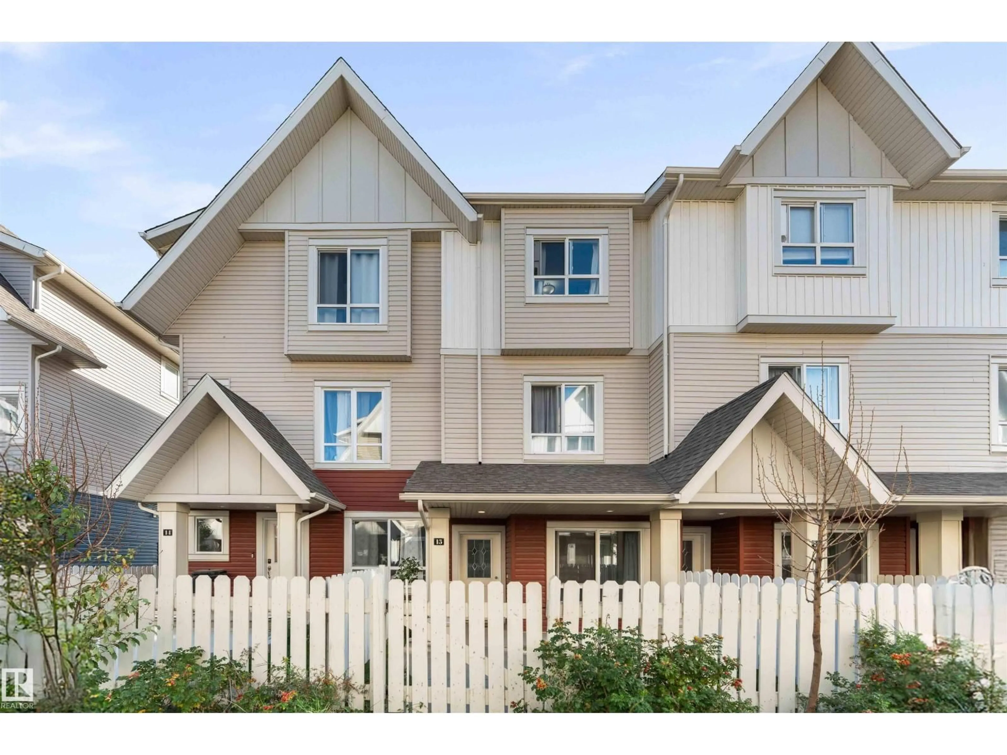 Home with vinyl exterior material, street for #15 - 13003 132 AV, Edmonton Alberta T5L3R2