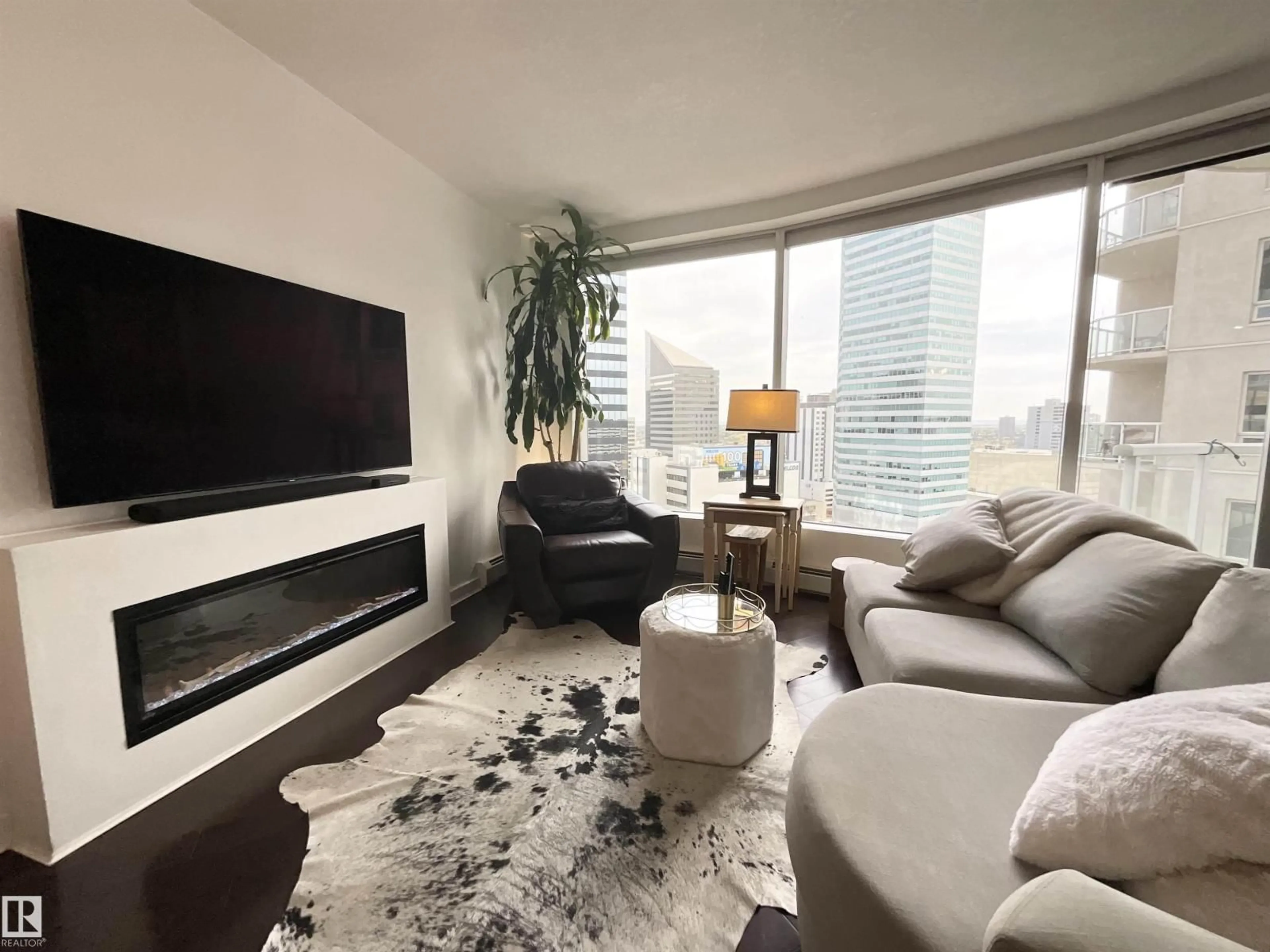 Living room with furniture, unknown for 10152 - 1504 104 ST, Edmonton Alberta T5J0B6
