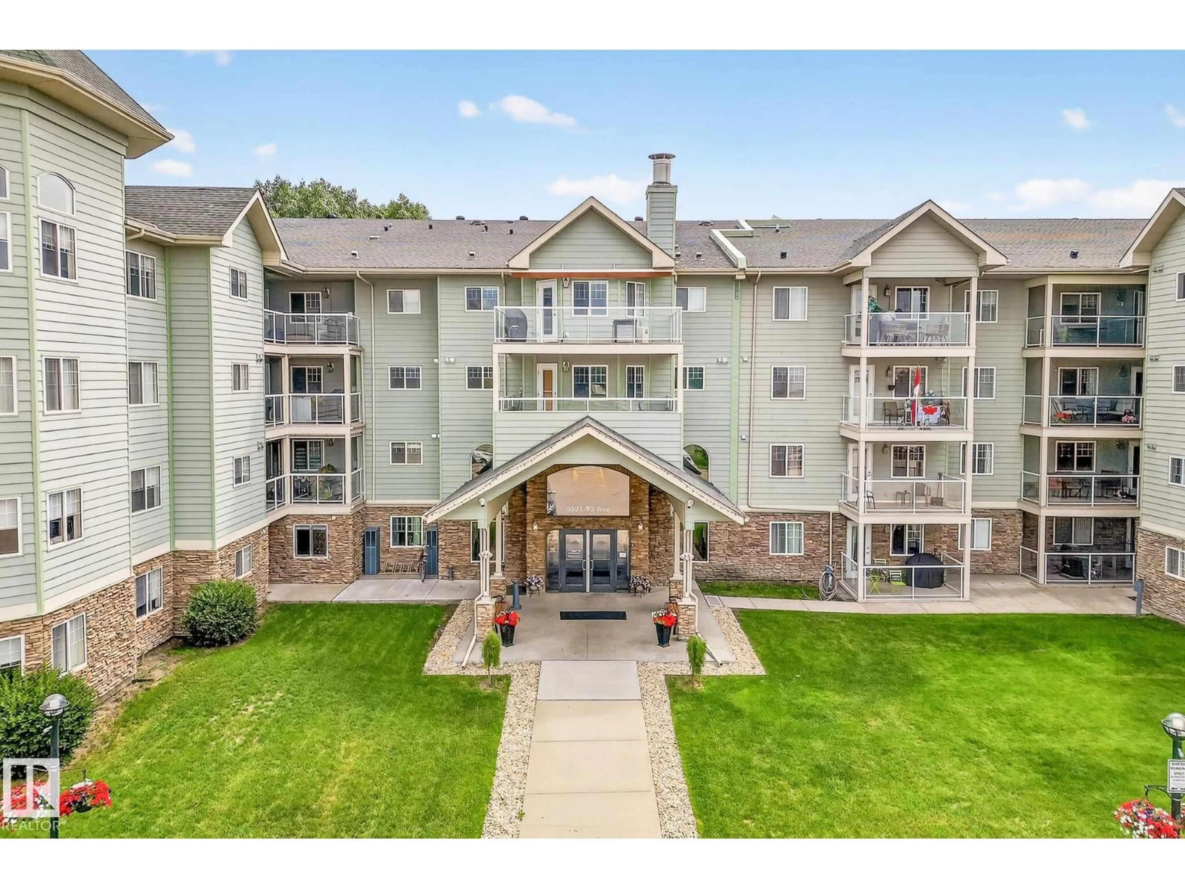 A pic from outside/outdoor area/front of a property/back of a property/a pic from drone, mountain view for 202 - 9995 93 AV, Fort Saskatchewan Alberta T8L1N5