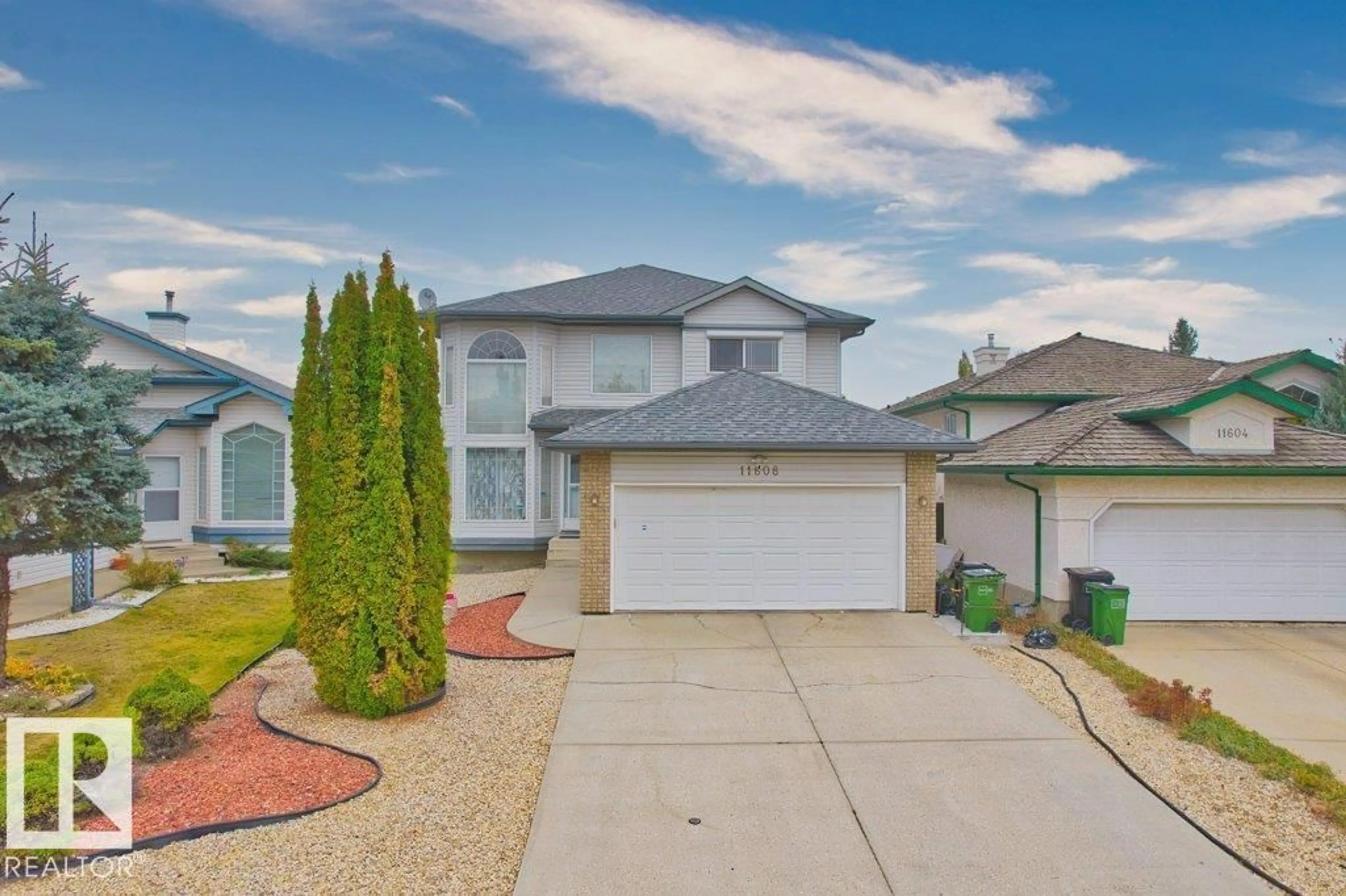 Home with vinyl exterior material, street for 11608 11A AV, Edmonton Alberta T6J6Y7