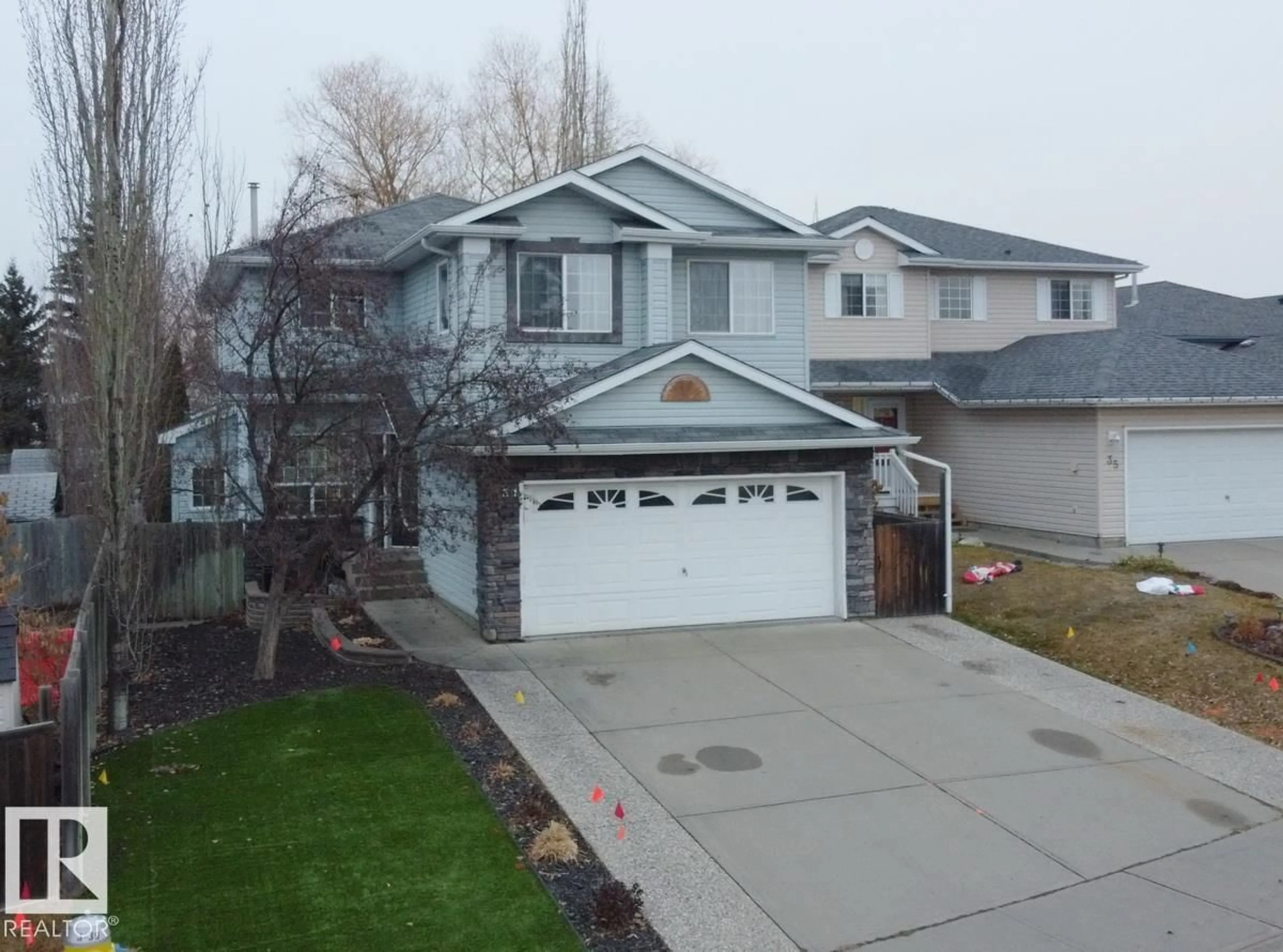 A pic from outside/outdoor area/front of a property/back of a property/a pic from drone, street for 31 WESTWOOD WY, Fort Saskatchewan Alberta T8L4G4