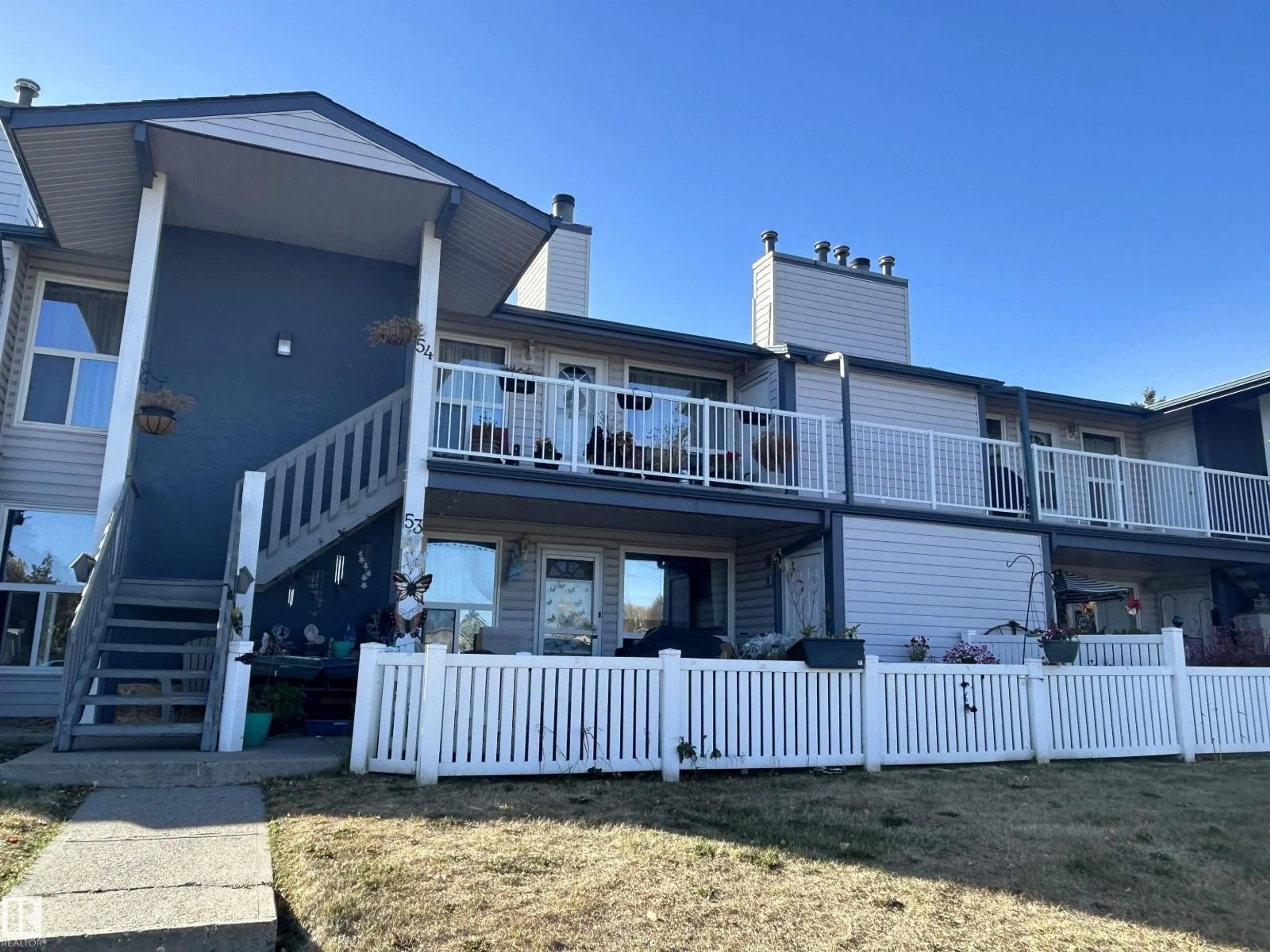 A pic from outside/outdoor area/front of a property/back of a property/a pic from drone, unknown for 53 14620 26 ST NW, Edmonton Alberta T5Y2J9