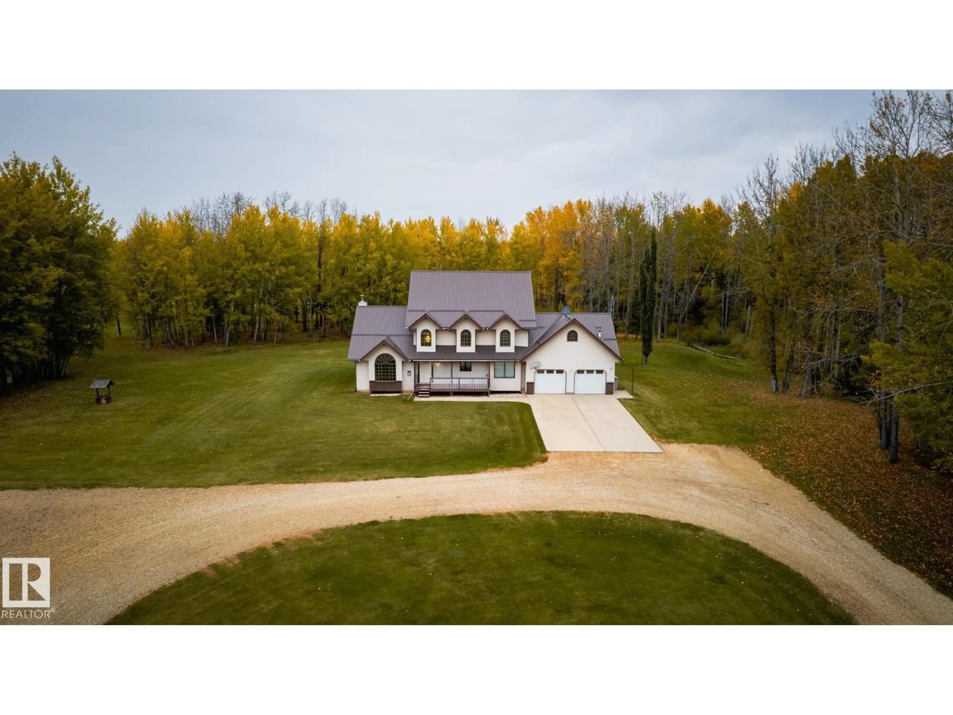 A pic from outside/outdoor area/front of a property/back of a property/a pic from drone, unknown for 63068 HWY 33, Rural Woodlands County Alberta T0G1A0