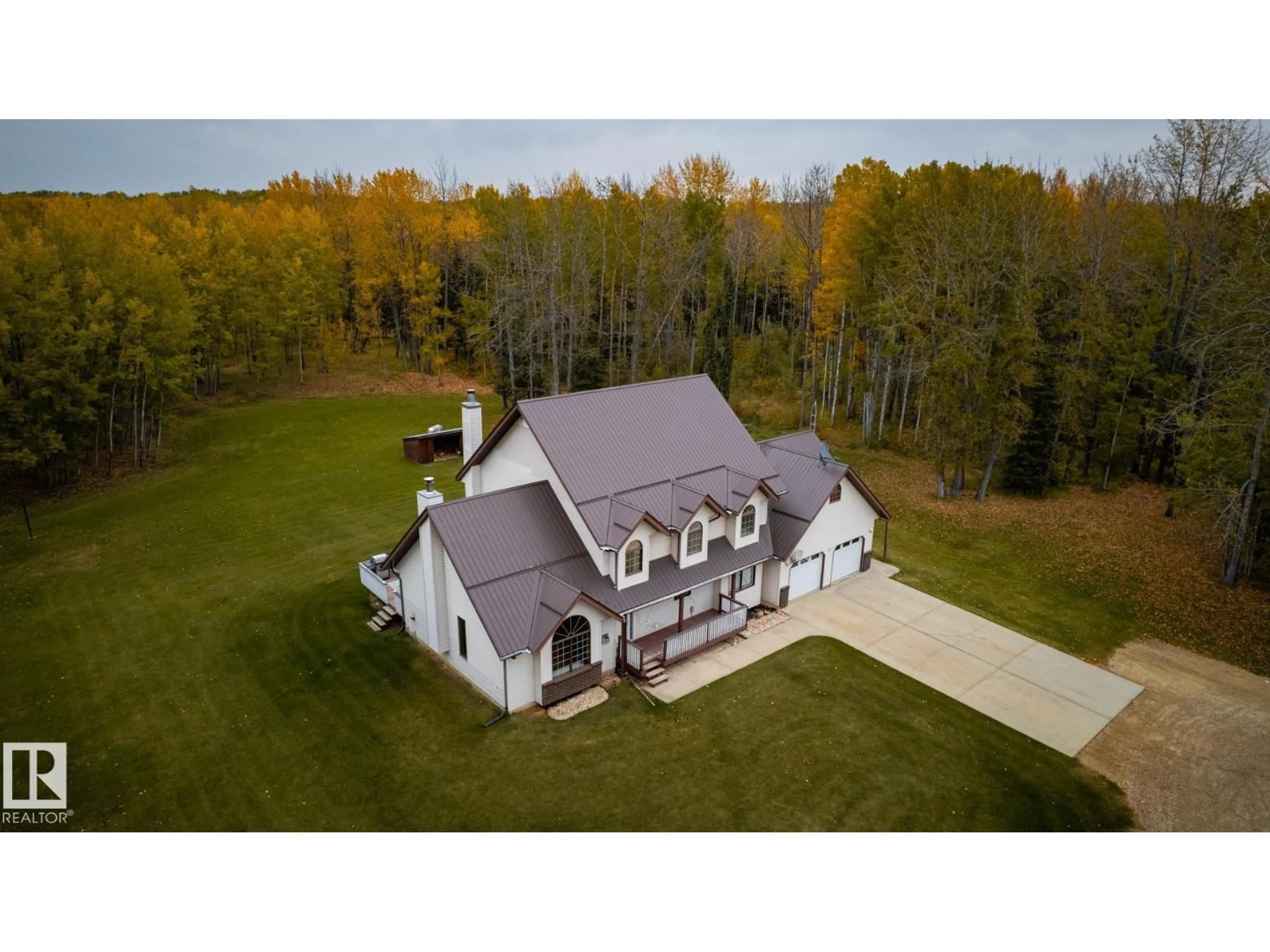 A pic from outside/outdoor area/front of a property/back of a property/a pic from drone, building for 63068 HWY 33, Rural Woodlands County Alberta T0G1A0