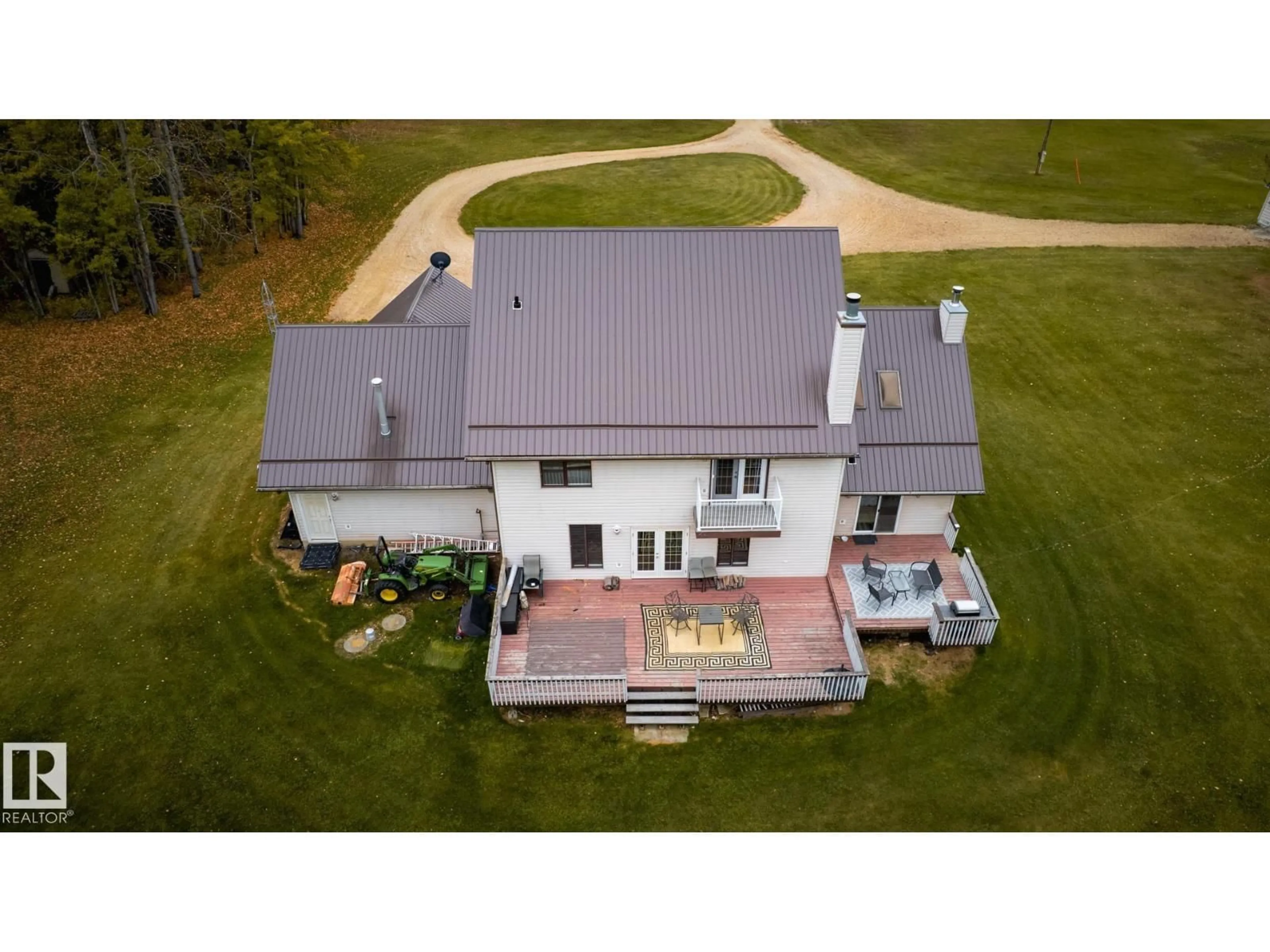 A pic from outside/outdoor area/front of a property/back of a property/a pic from drone, building for 63068 HWY 33, Rural Woodlands County Alberta T0G1A0