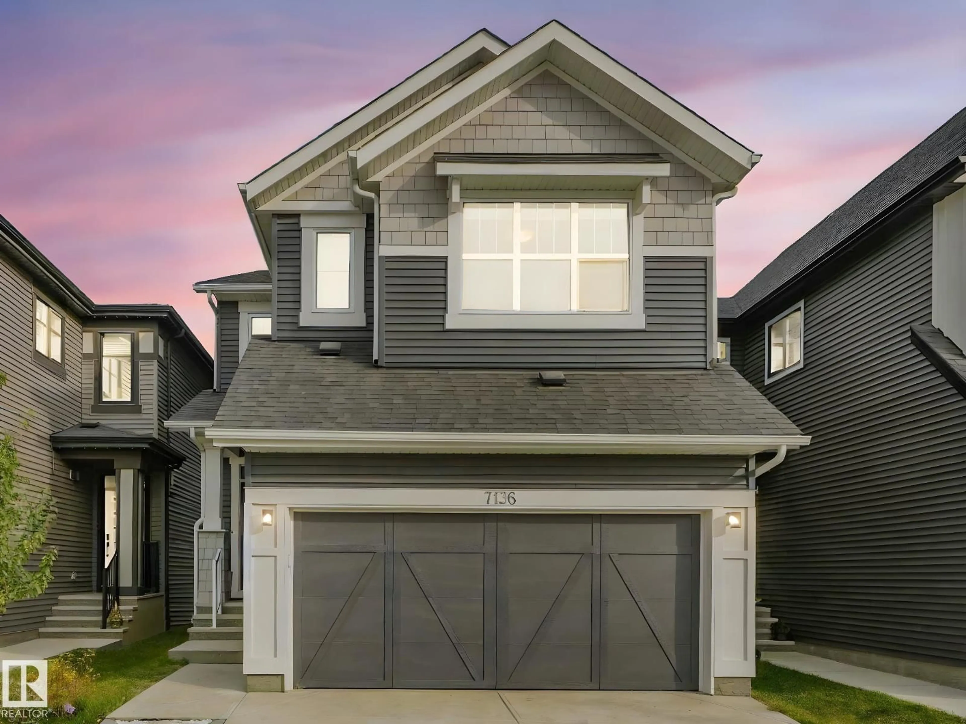 Home with vinyl exterior material, street for 7136 52 AV, Beaumont Alberta T4X2Z8