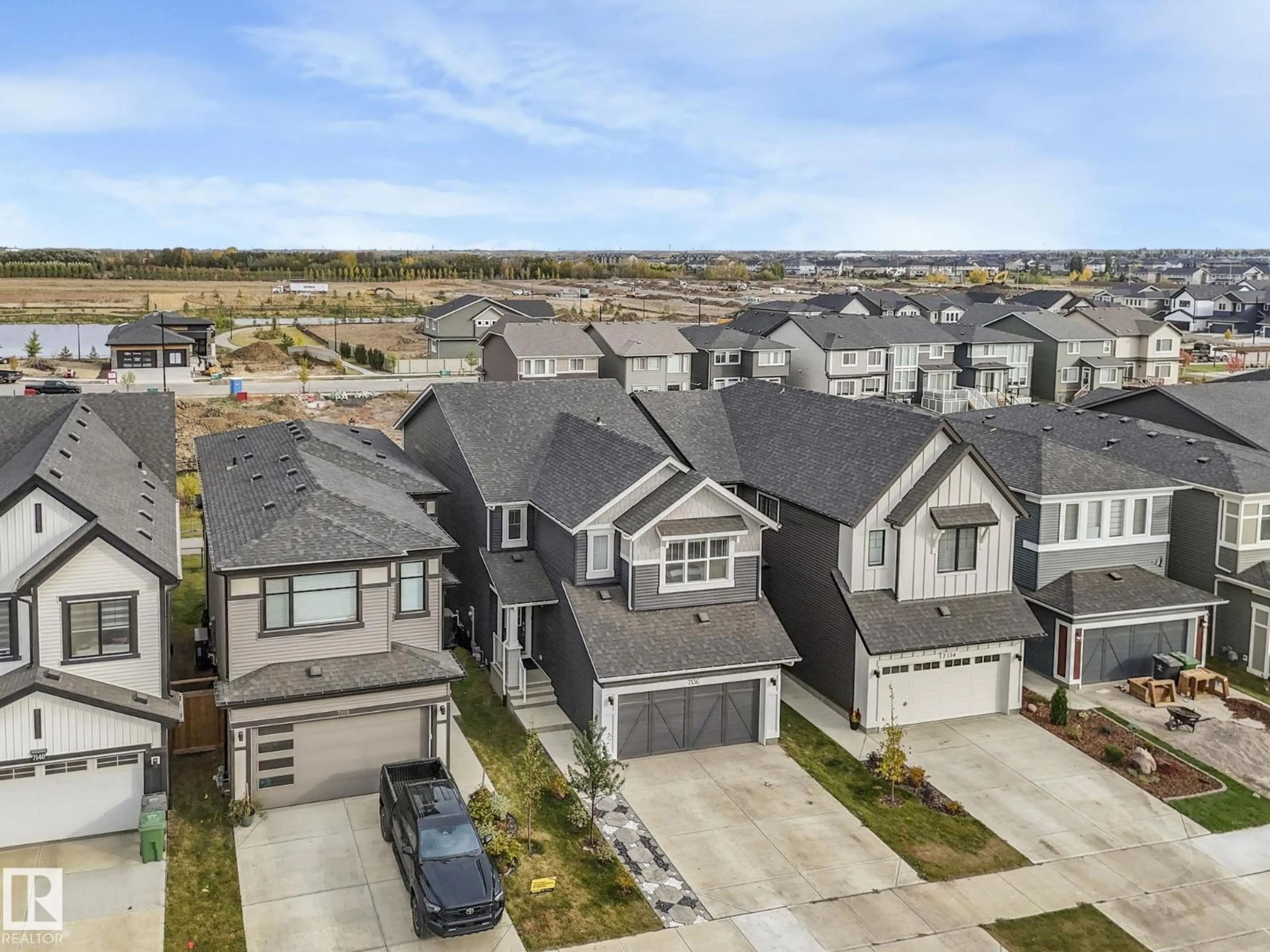 A pic from outside/outdoor area/front of a property/back of a property/a pic from drone, street for 7136 52 AV, Beaumont Alberta T4X2Z8