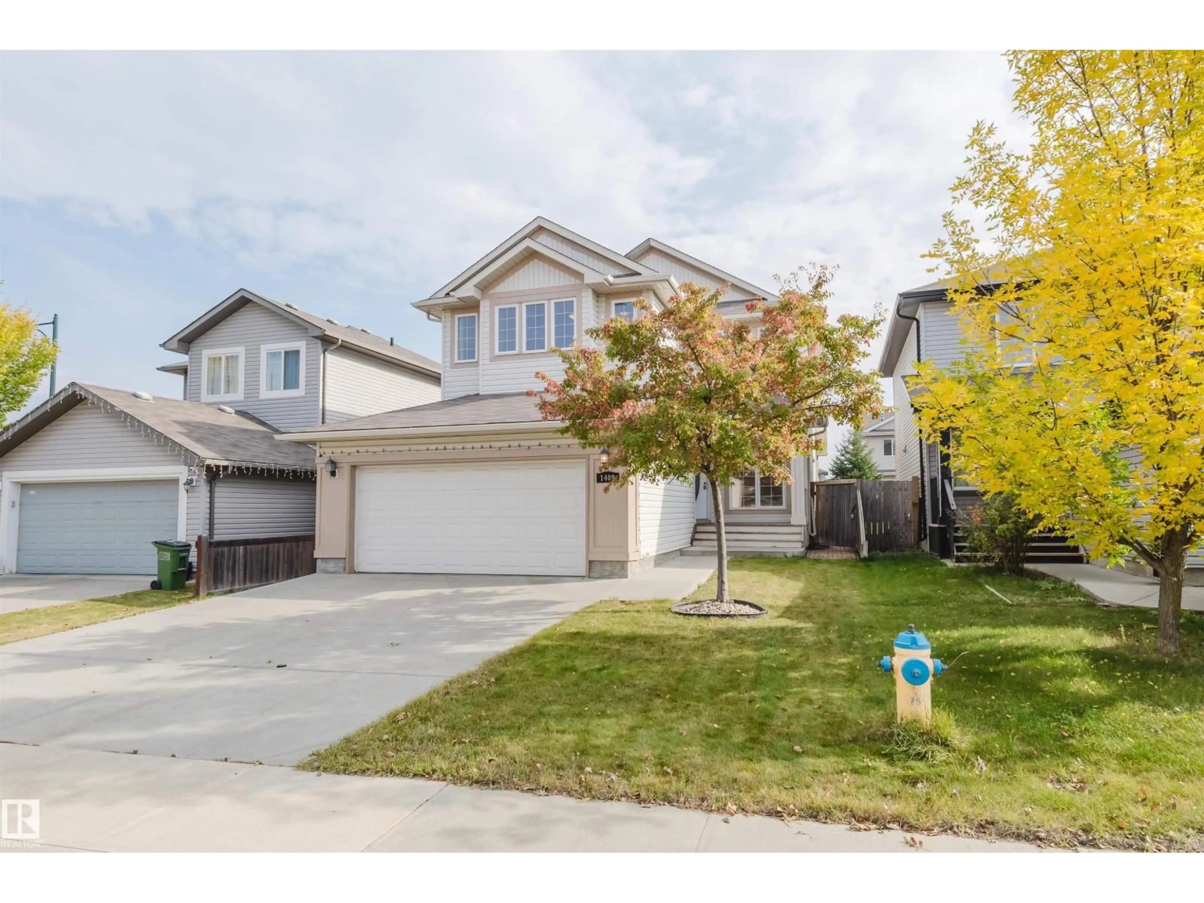 Home with vinyl exterior material, street for SW - 1409 114B ST, Edmonton Alberta T6W0N2