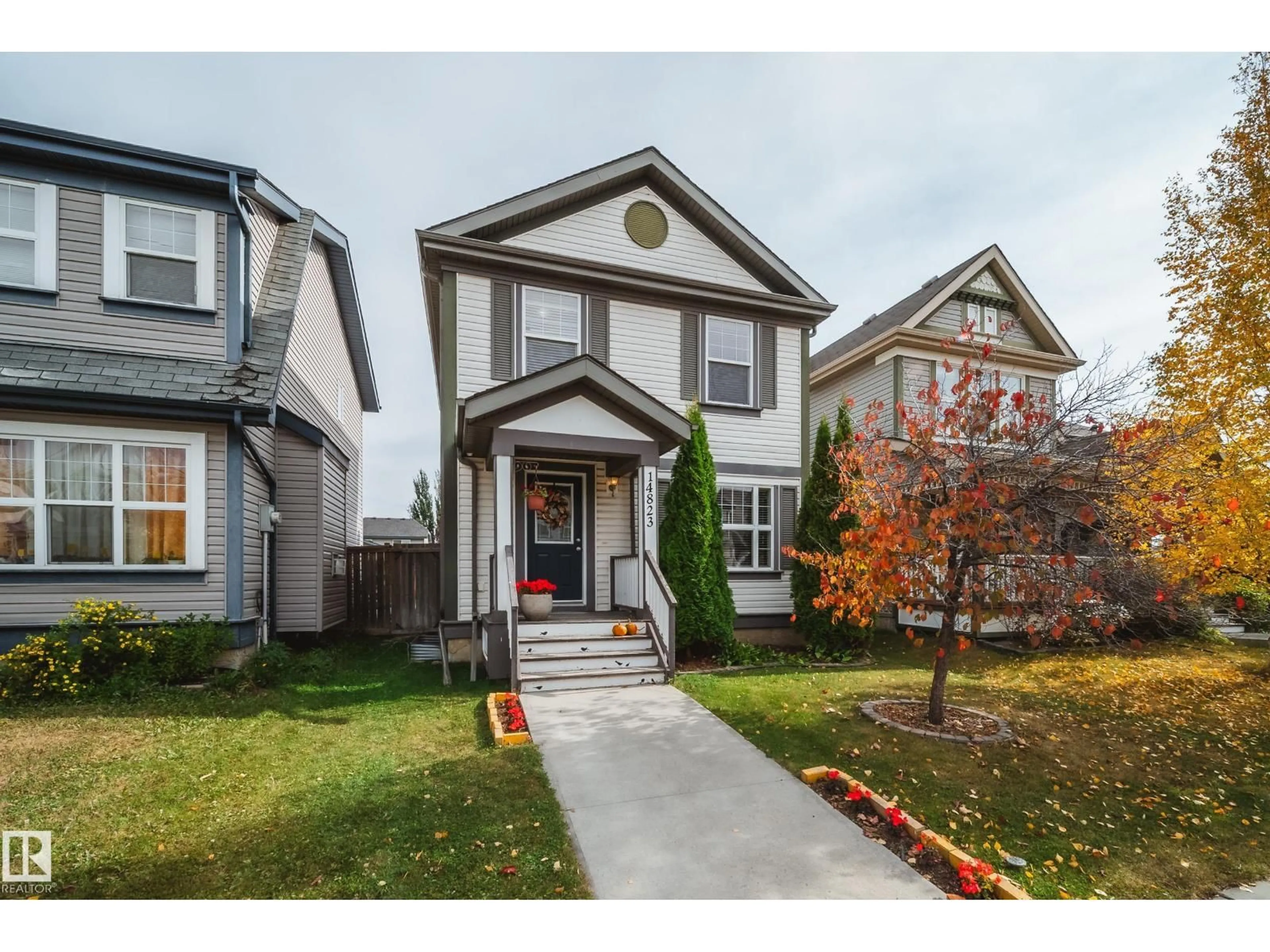 Home with vinyl exterior material, street for 14823 140 ST, Edmonton Alberta T6V0A9