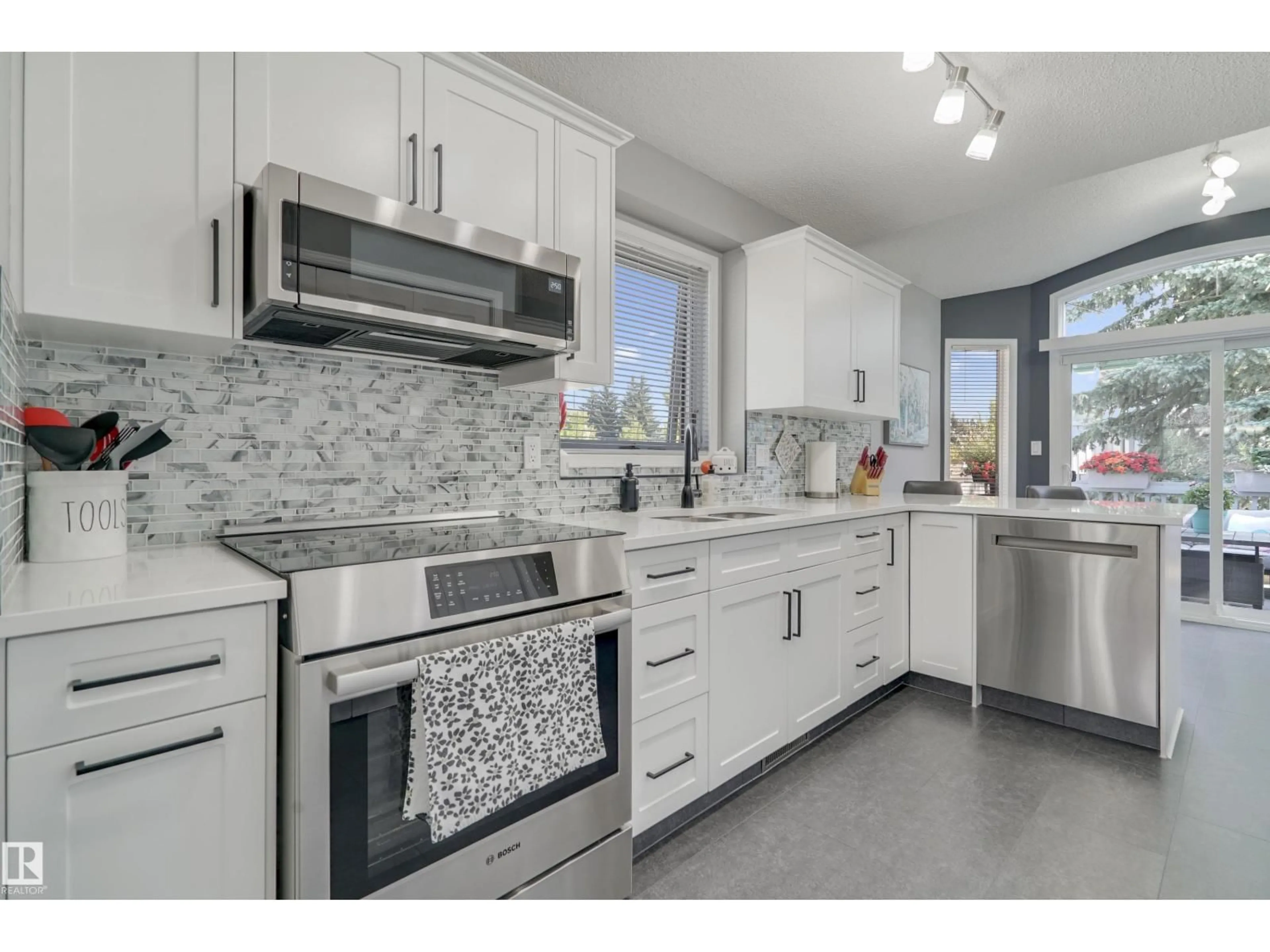 Open concept kitchen, ceramic/tile floor for 1038 CARTER CREST RD, Edmonton Alberta T6R2K2