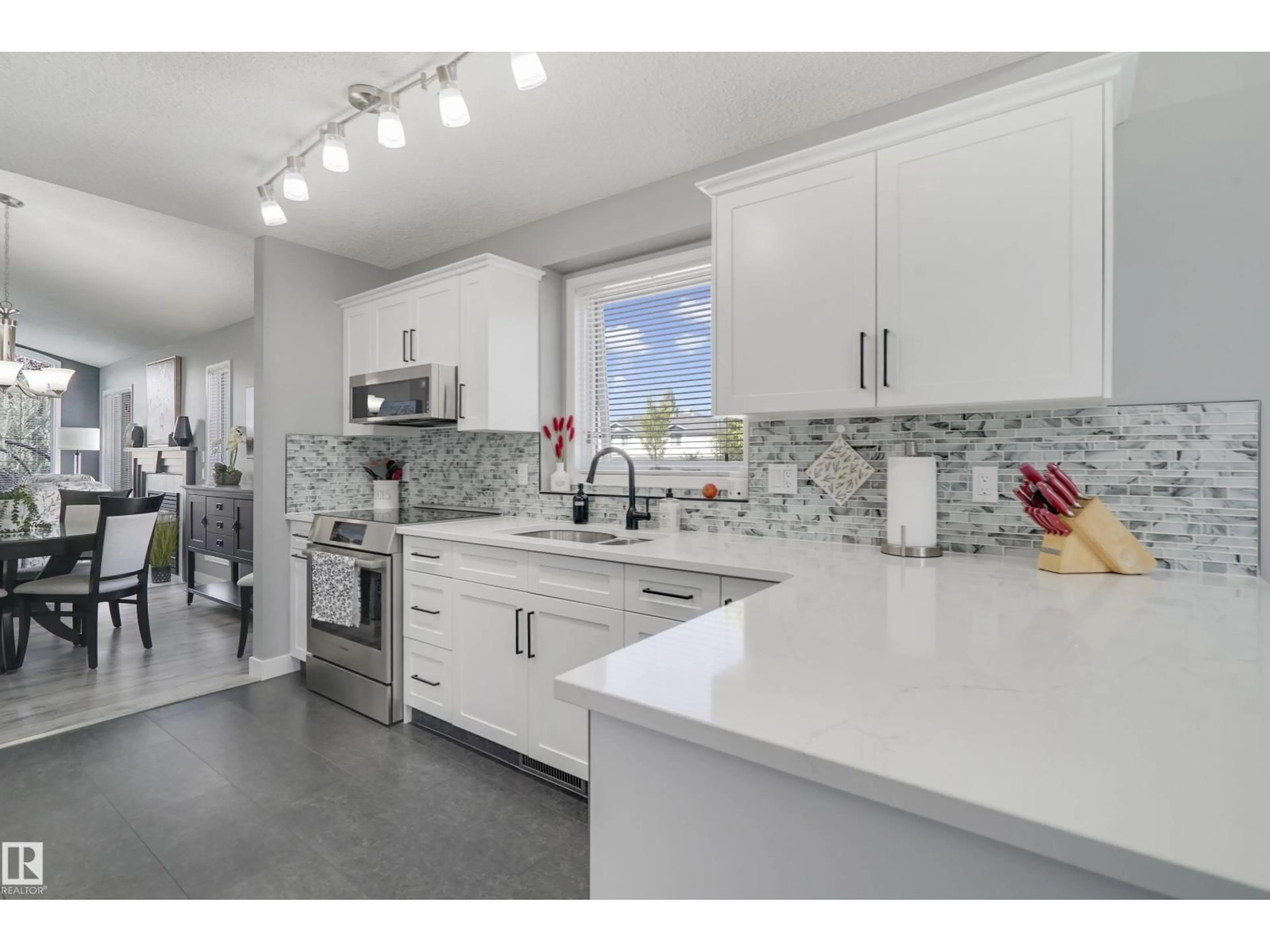 Open concept kitchen, ceramic/tile floor for 1038 CARTER CREST RD, Edmonton Alberta T6R2K2
