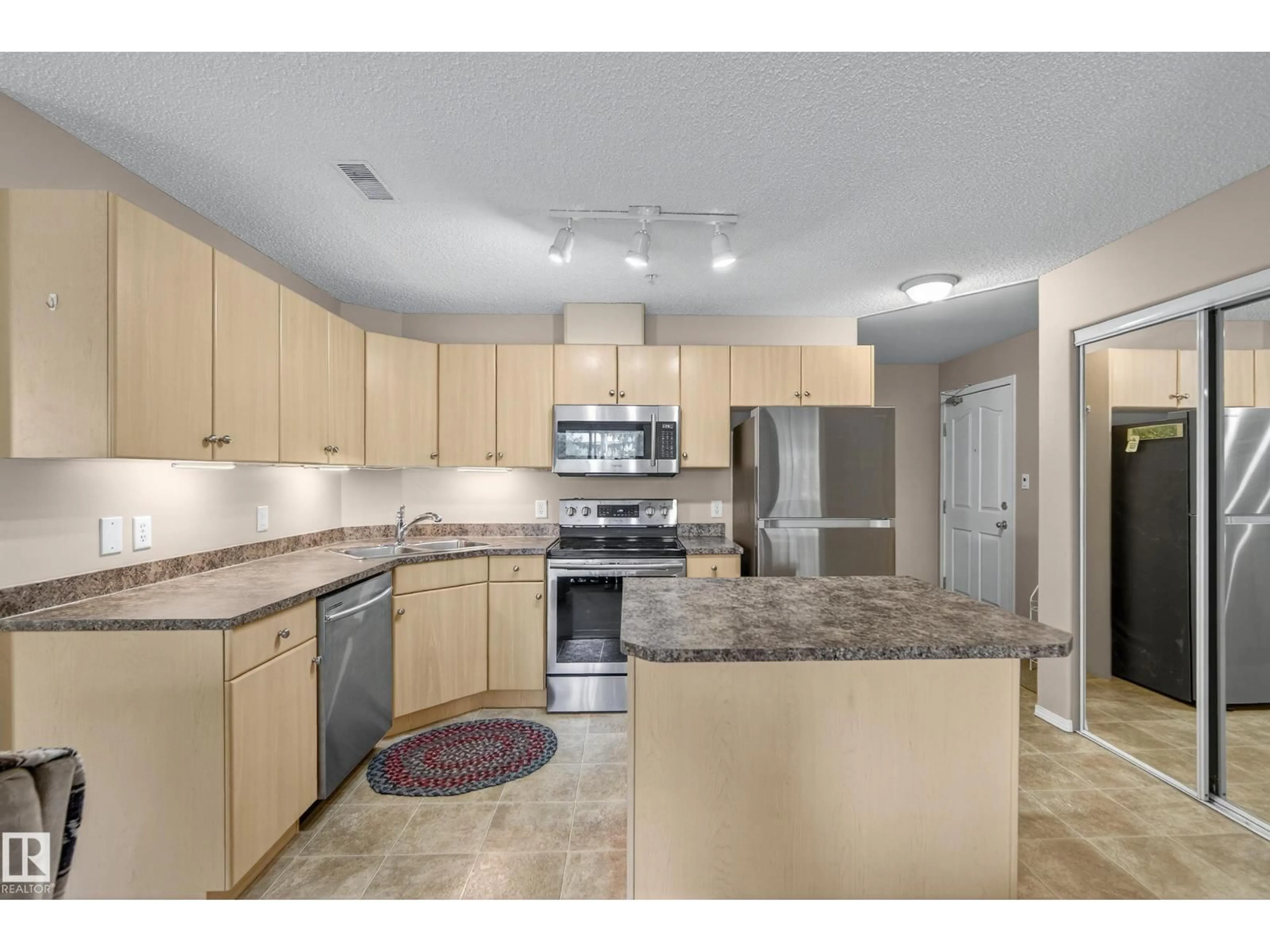 Open concept kitchen, unknown for 227 16303 95 ST NW, Edmonton Alberta T5Z3V1