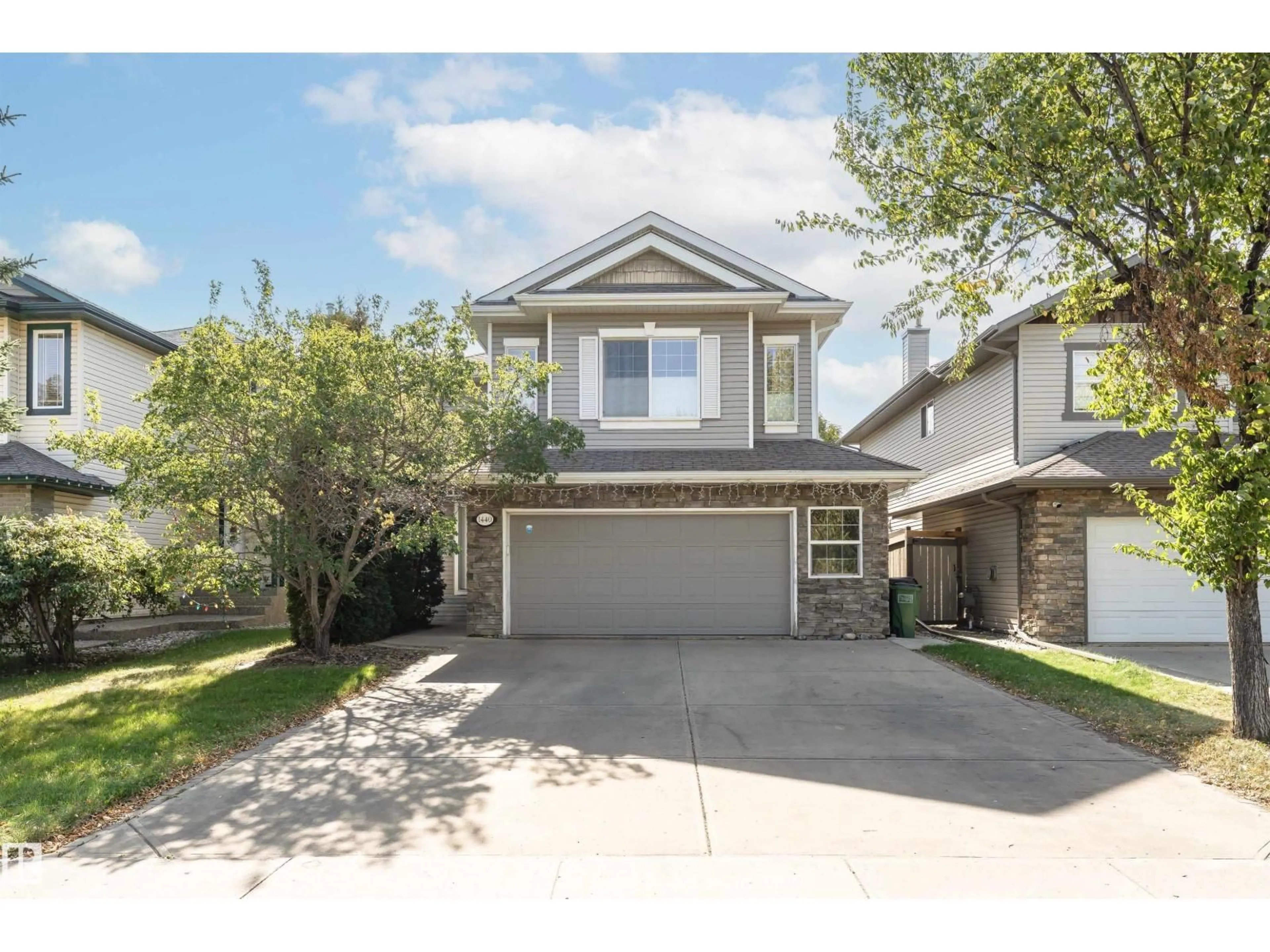 Home with vinyl exterior material, street for 1440 POTTER GREENS DR, Edmonton Alberta T5T1J8