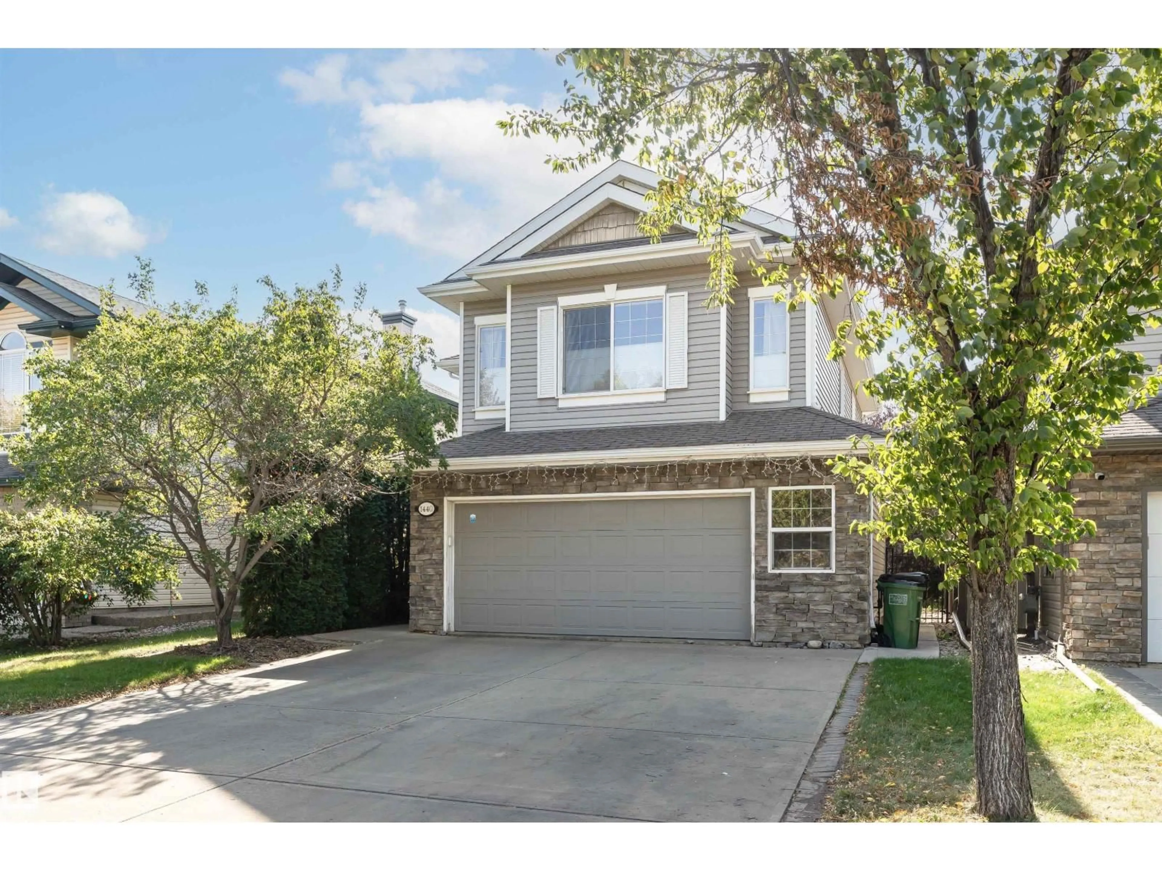 Home with vinyl exterior material, street for 1440 POTTER GREENS DR, Edmonton Alberta T5T1J8