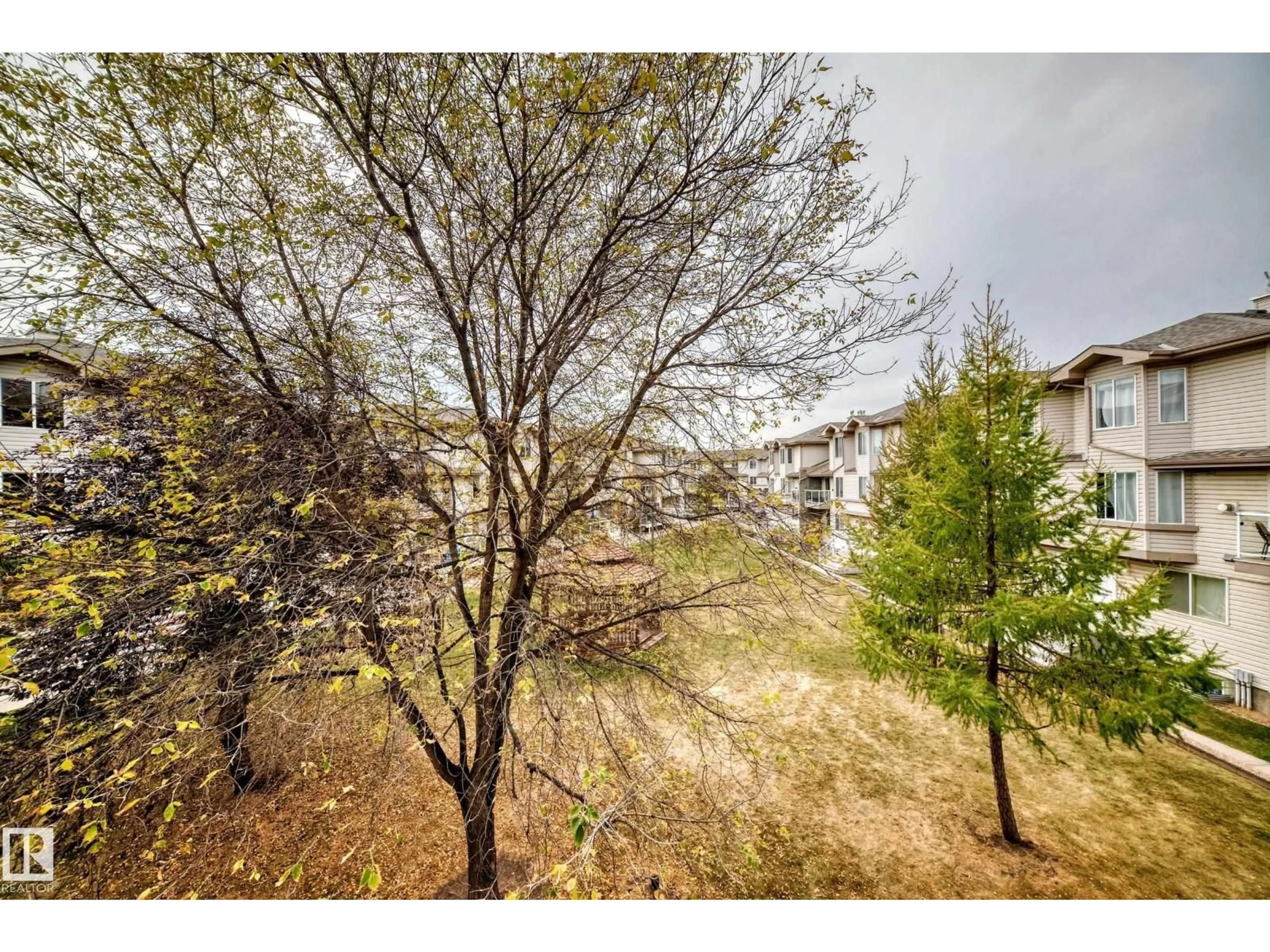 A pic from outside/outdoor area/front of a property/back of a property/a pic from drone, forest/trees view for #58 - 2505 42 ST, Edmonton Alberta T6L7G8