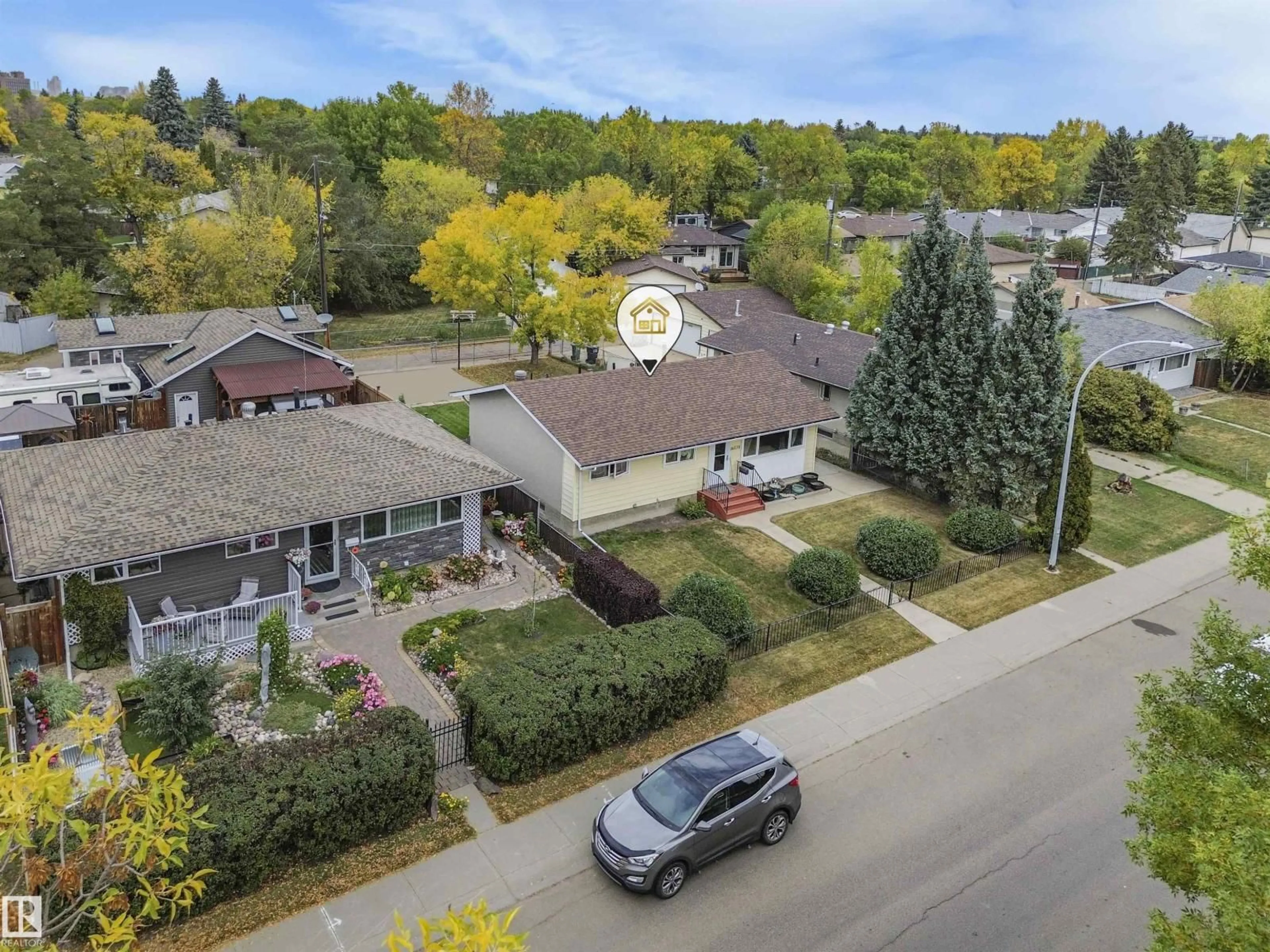 A pic from outside/outdoor area/front of a property/back of a property/a pic from drone, street for 16530 104 AV, Edmonton Alberta T5P0S7