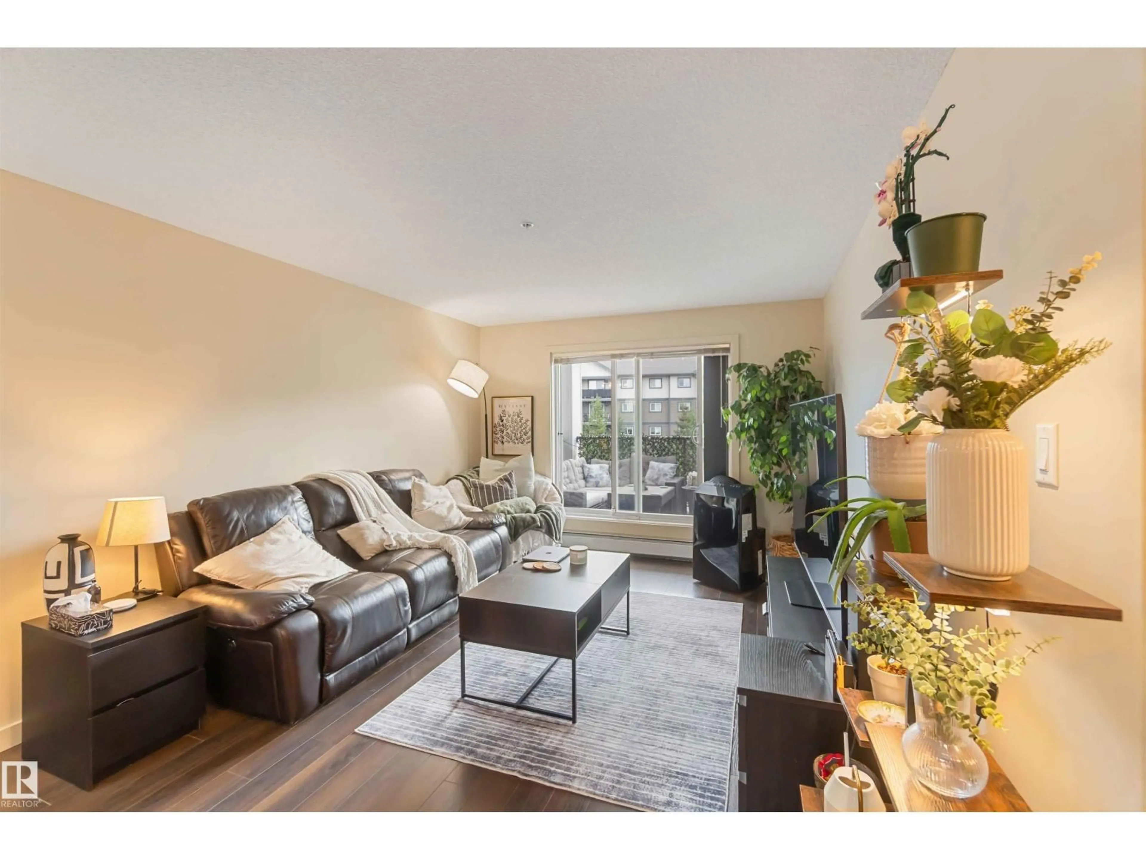 Living room with furniture, unknown for 6084 - 316 STANTON DR, Edmonton Alberta T6X0Z4