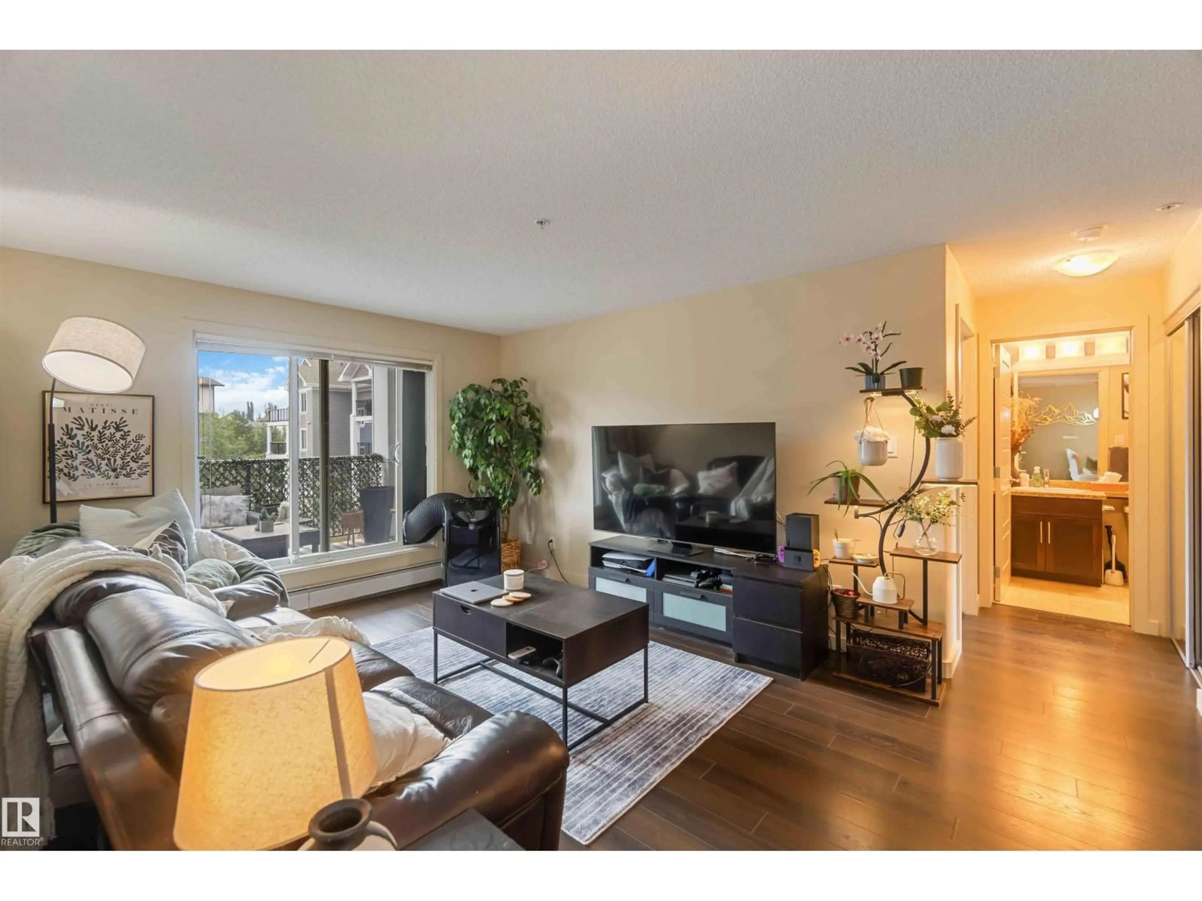 Living room with furniture, unknown for 6084 - 316 STANTON DR, Edmonton Alberta T6X0Z4