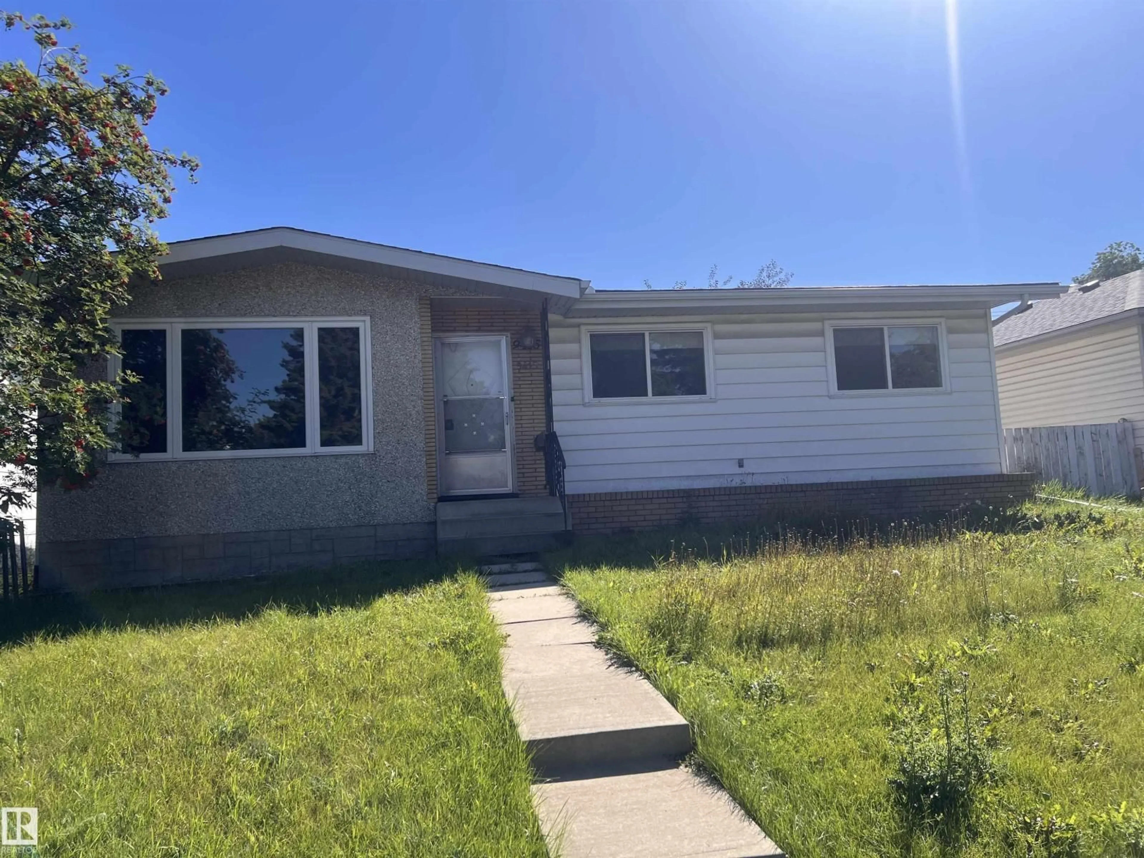 Home with vinyl exterior material, street for NW - 9415 149 ST, Edmonton Alberta T5R1C5