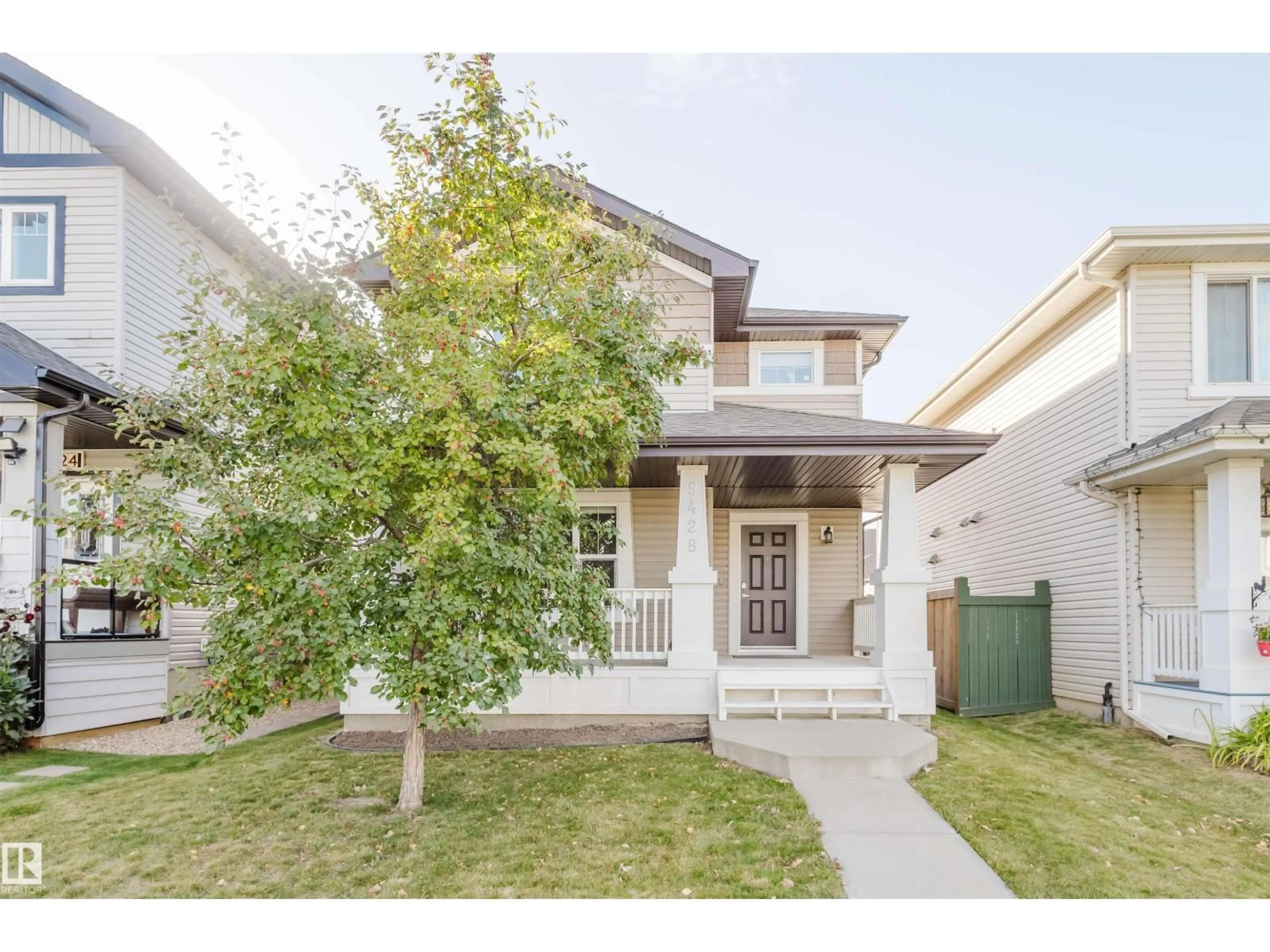 Home with vinyl exterior material, street for NW - 9428 212 ST, Edmonton Alberta T5T4R3