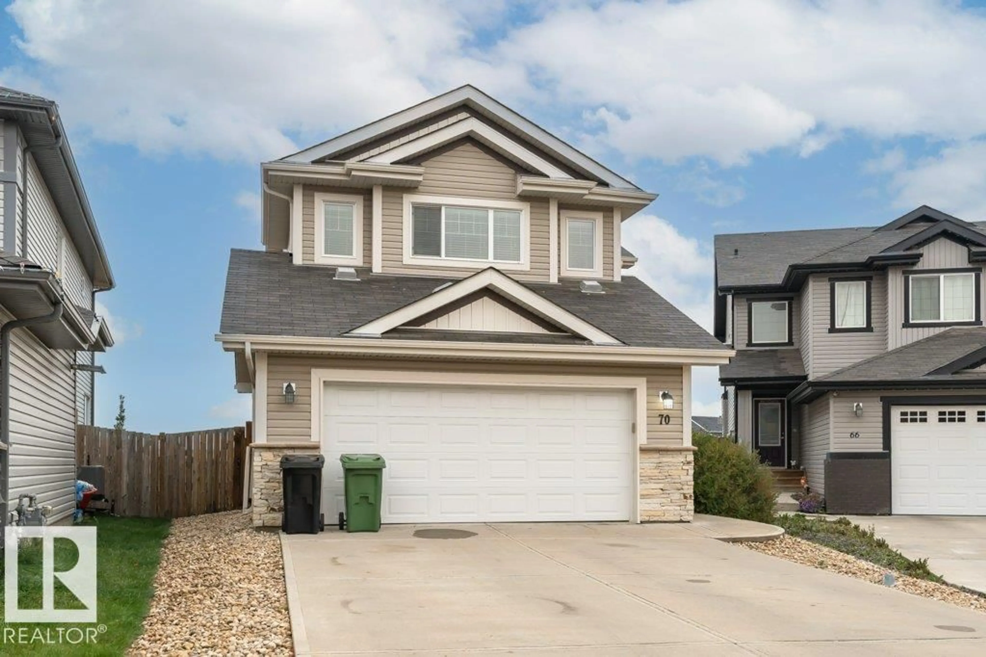 Home with vinyl exterior material, street for 70 SANTANA CR, Fort Saskatchewan Alberta T8L0N8