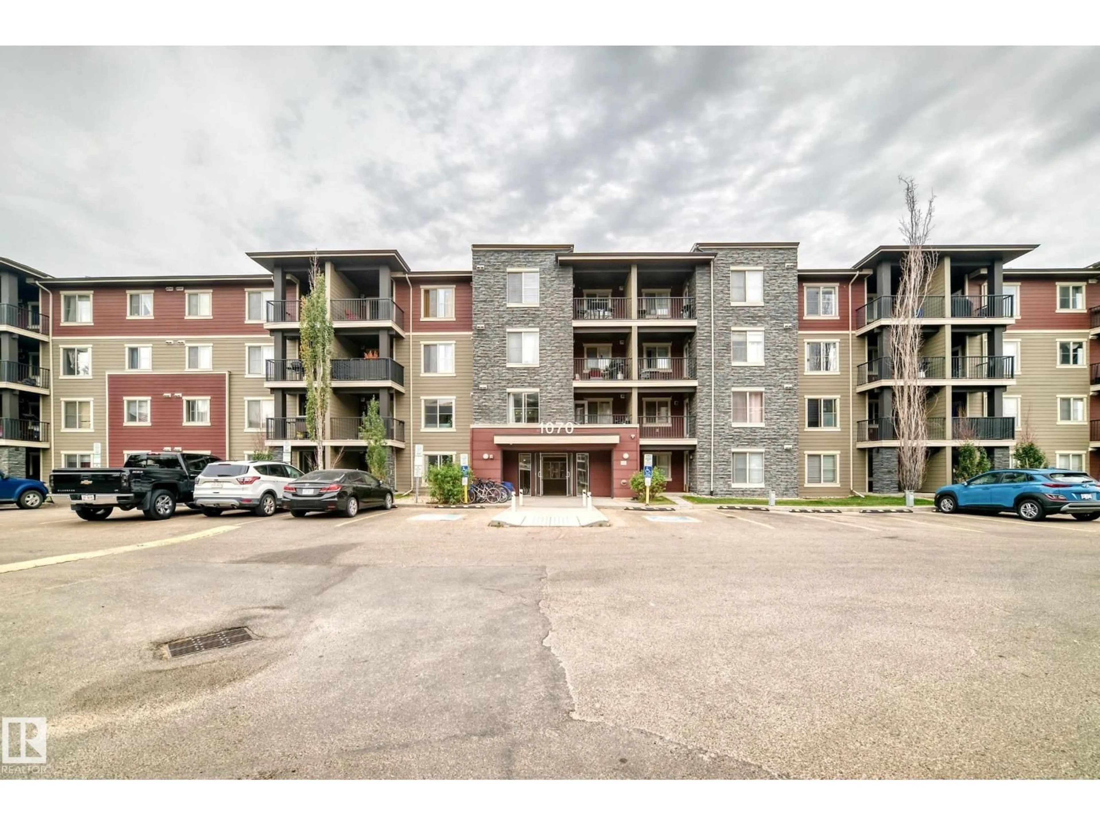 A pic from outside/outdoor area/front of a property/back of a property/a pic from drone, building for #303 - 1070 MCCONACHIE BLVD NW, Edmonton Alberta T5Y0X1