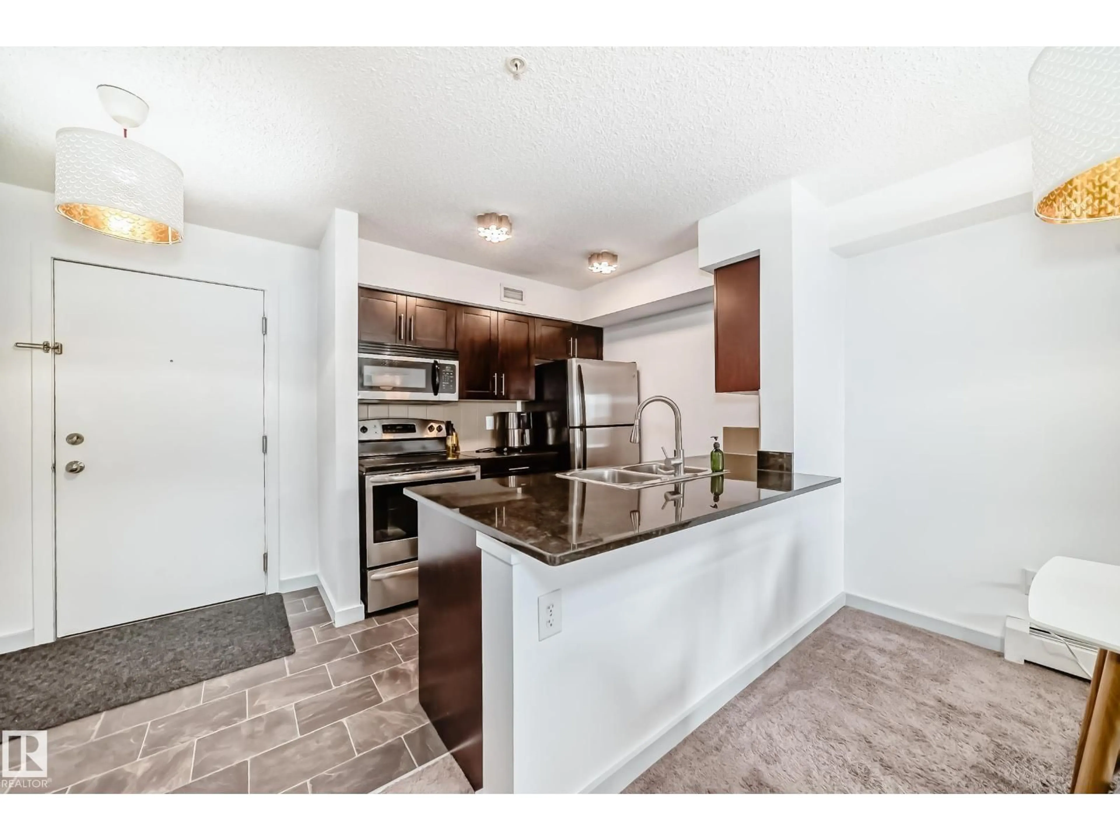 Open concept kitchen, ceramic/tile floor for #303 - 1070 MCCONACHIE BLVD NW, Edmonton Alberta T5Y0X1